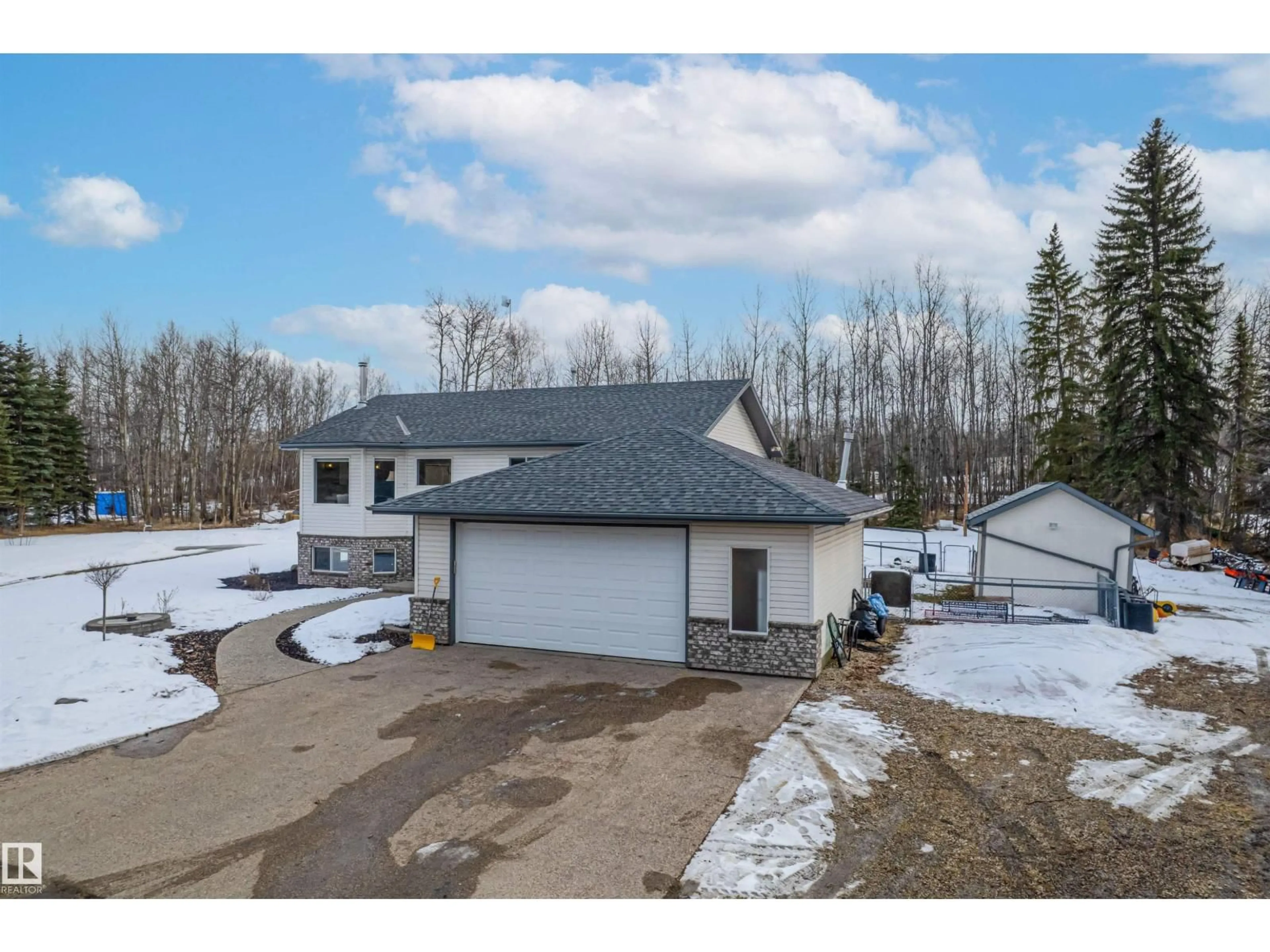 A pic from outside/outdoor area/front of a property/back of a property/a pic from drone, unknown for 73 51069 RD, Rural Strathcona County Alberta T8E1G7