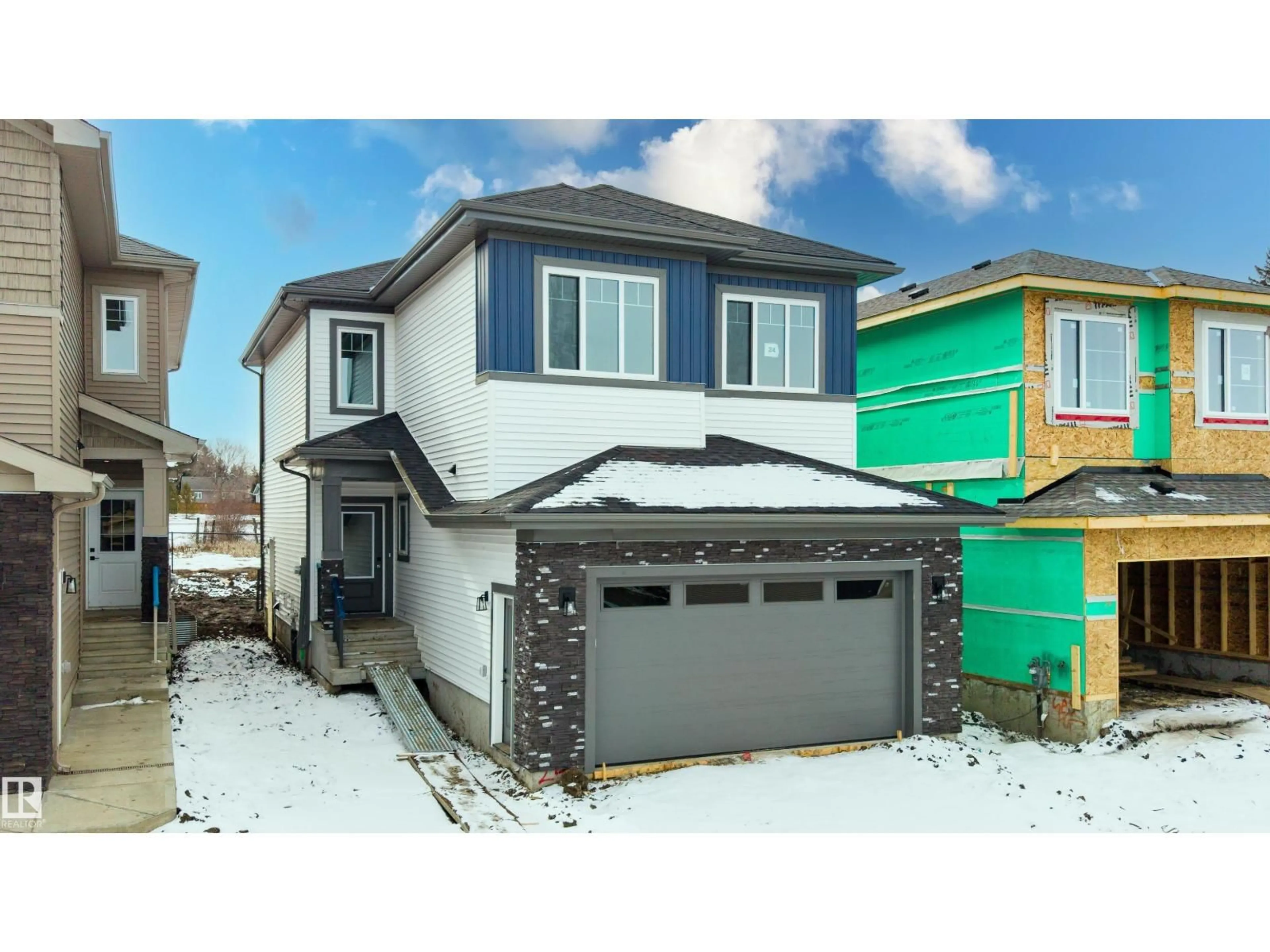 Home with vinyl exterior material, street for 24 MEADOWGROVE LD, Spruce Grove Alberta T7X0W2