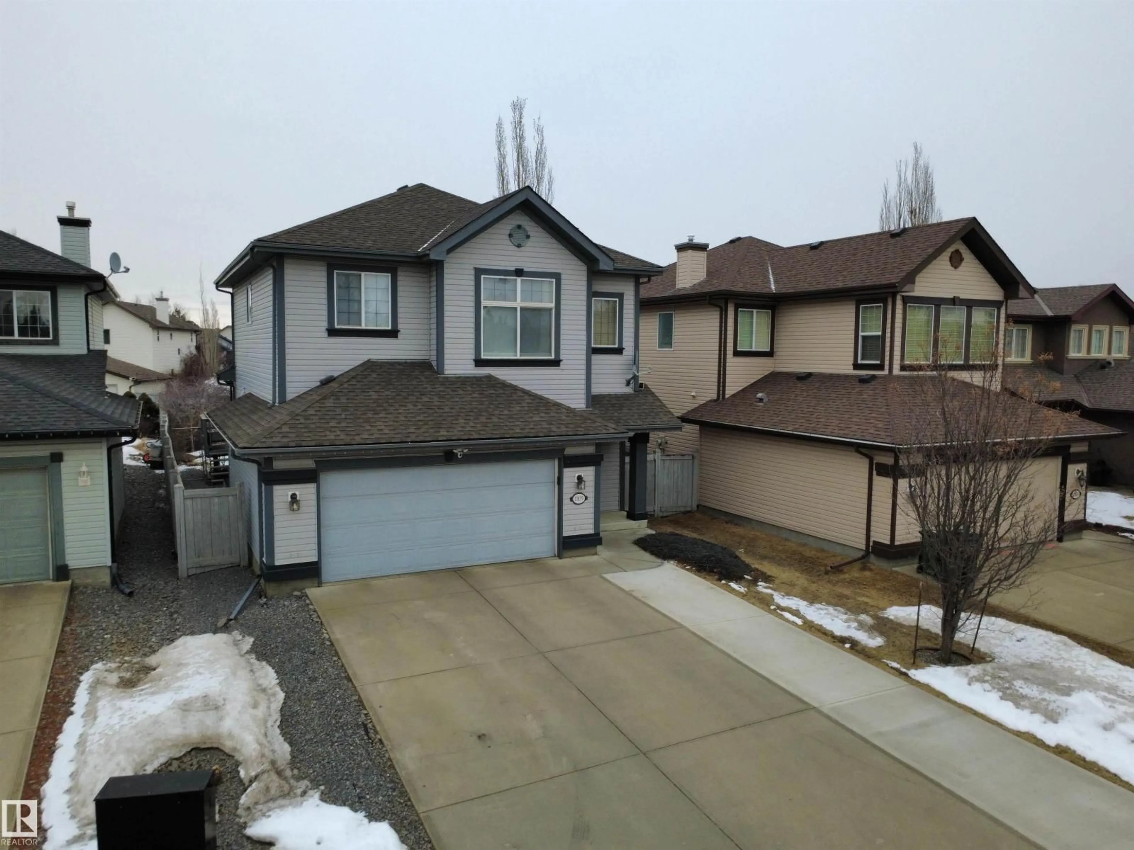 Home with vinyl exterior material, street for NW - 1105 GLASTONBURY CO, Edmonton Alberta T5T6M7