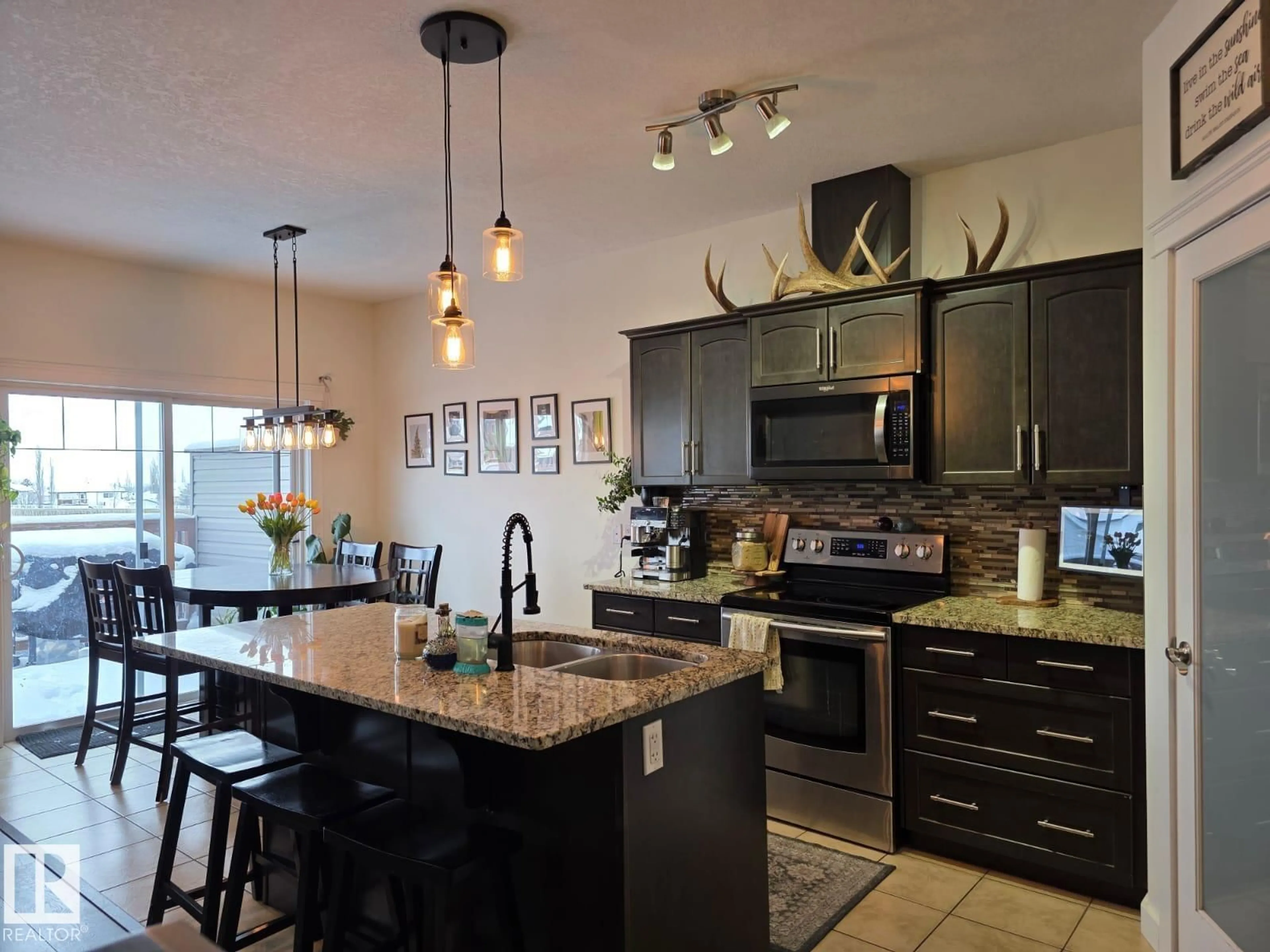 Open concept kitchen, ceramic/tile floor for 4012 41B AV, Drayton Valley Alberta T7A1B5