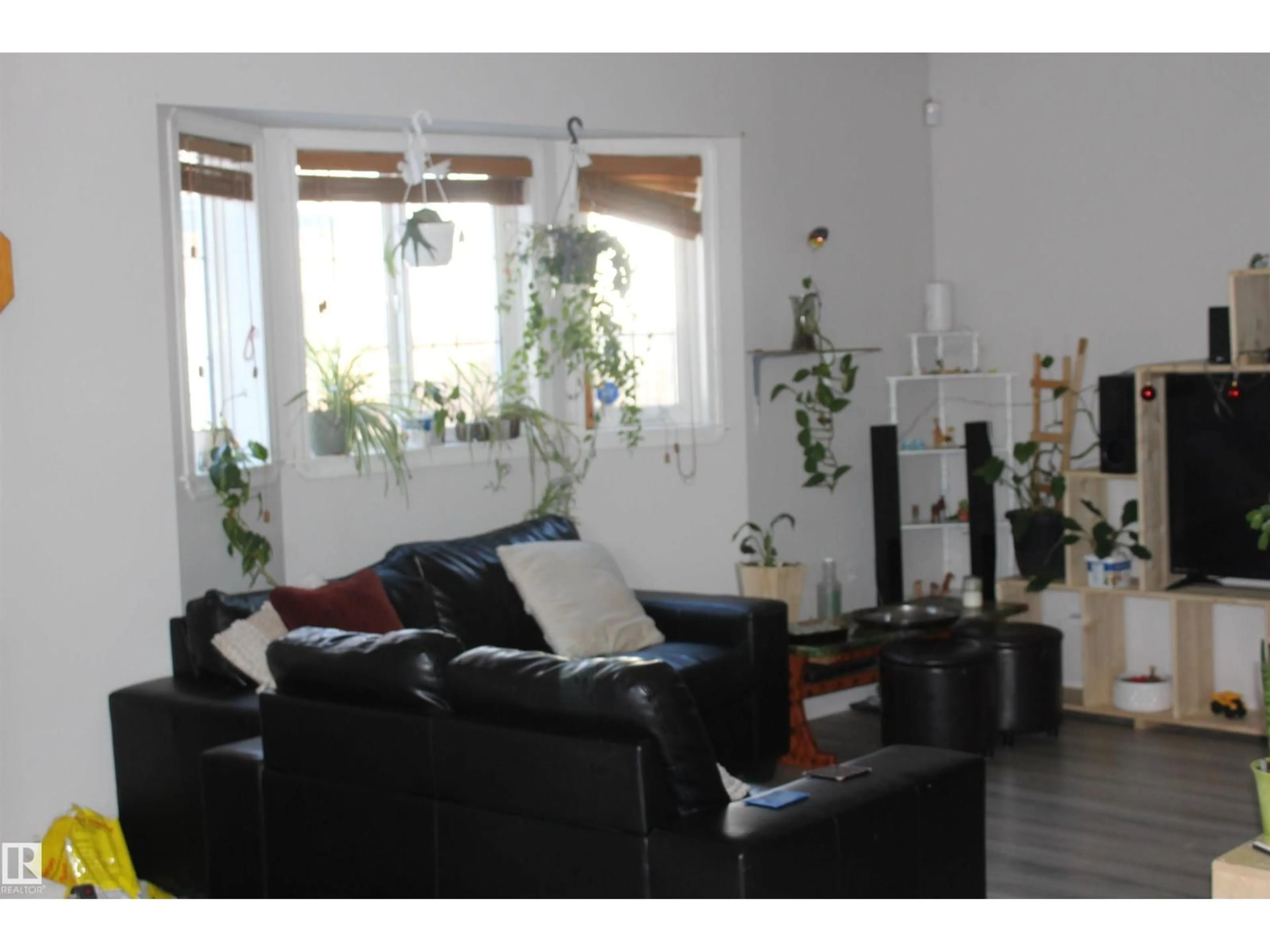 Living room with furniture, unknown for 11927 96 ST, Edmonton Alberta T5J2R4