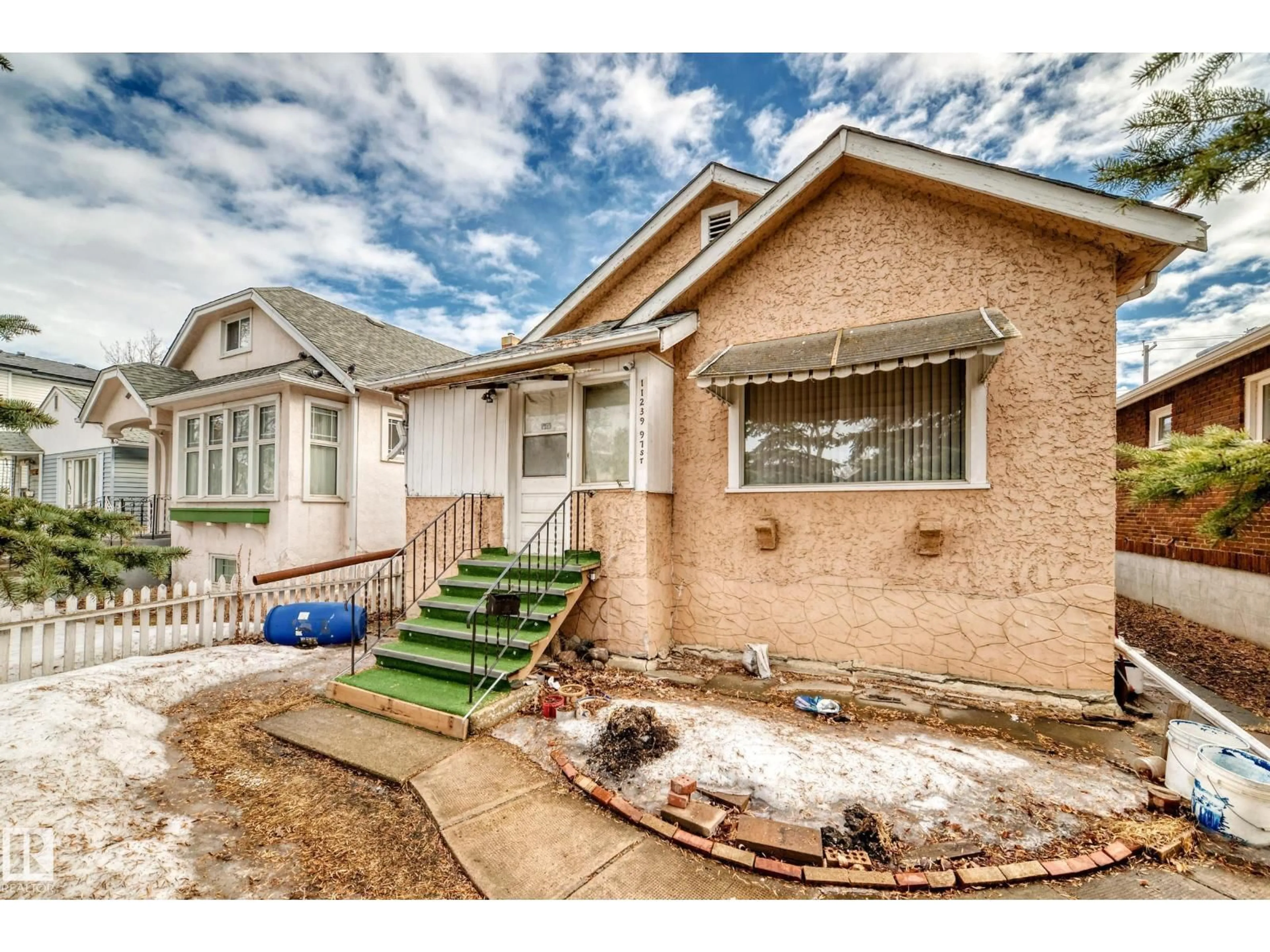 Home with brick exterior material, street for NW - 11239 97 ST, Edmonton Alberta T5G1X2