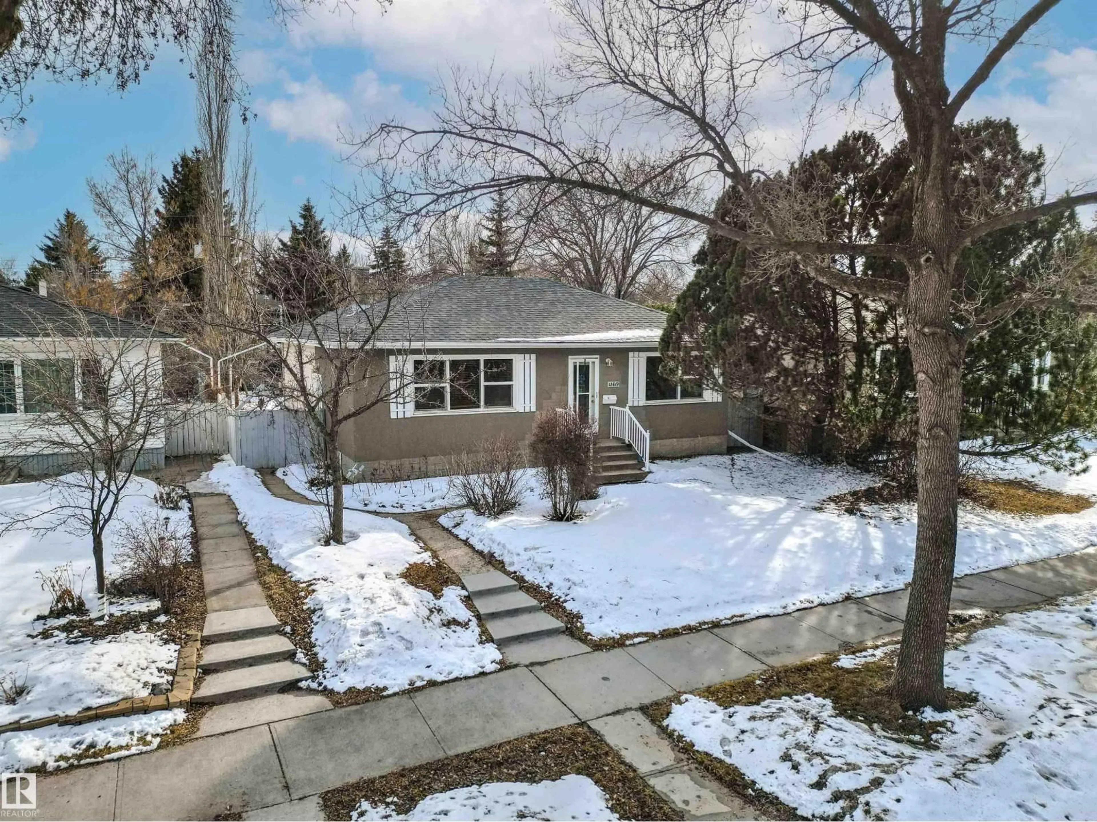 A pic from outside/outdoor area/front of a property/back of a property/a pic from drone, street for 13619 108 AV, Edmonton Alberta T5M2C7