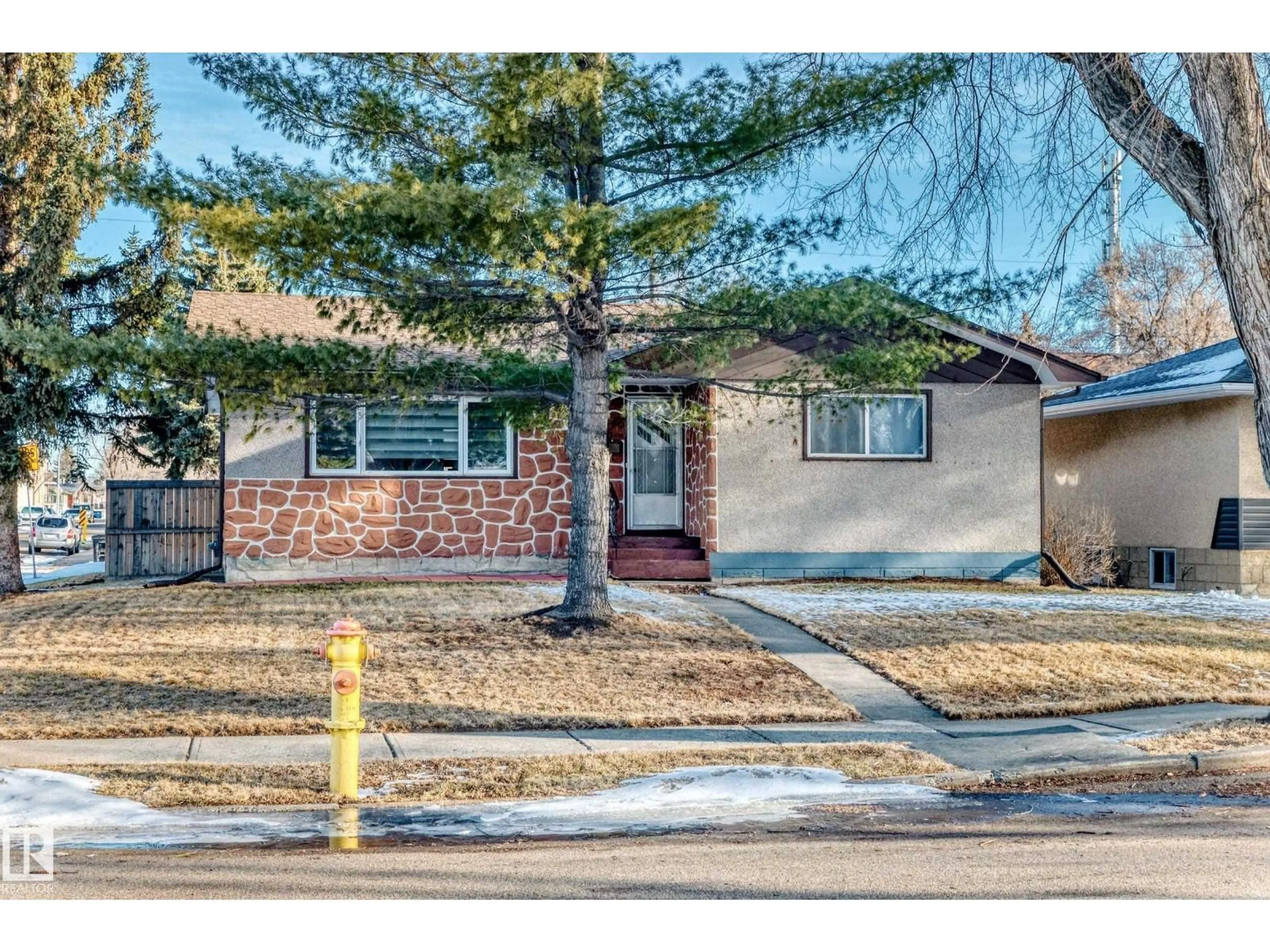 Home with brick exterior material, street for 4446 116 AV, Edmonton Alberta T5W0X3