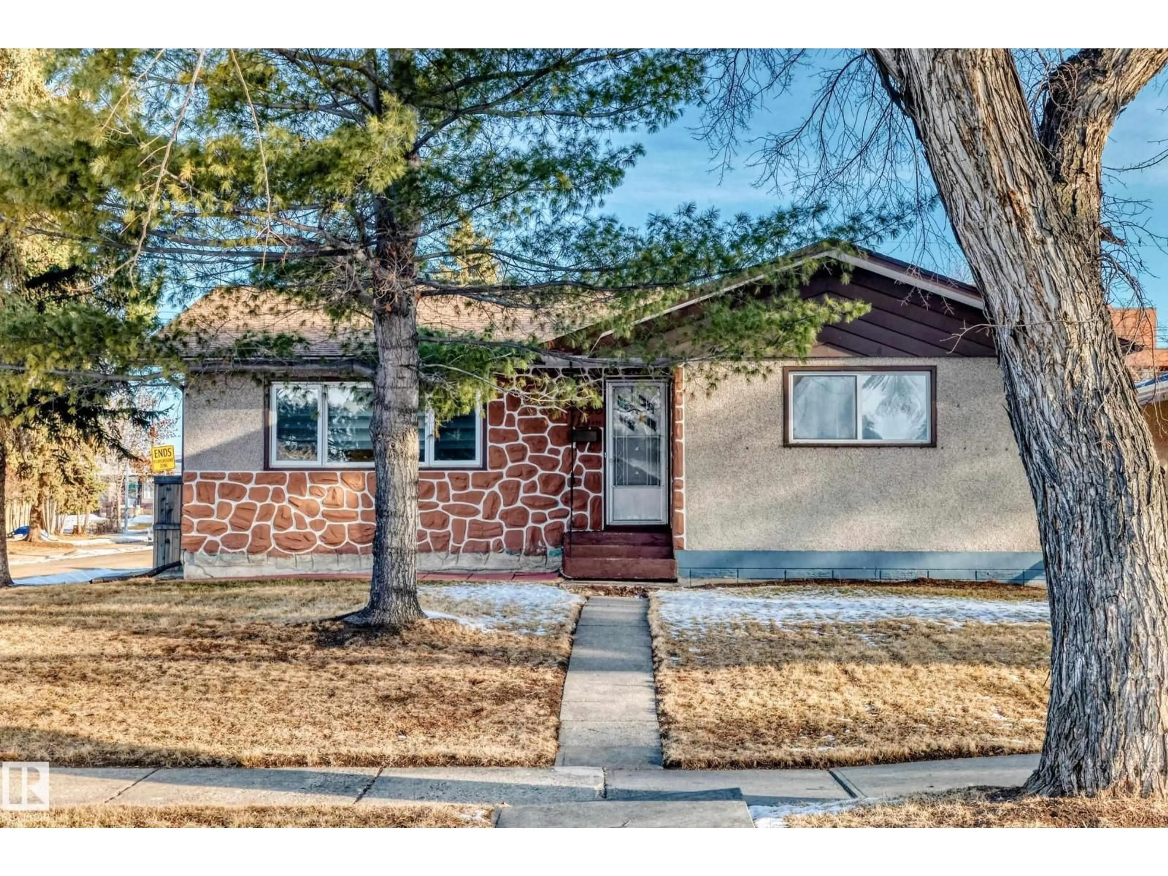 Home with brick exterior material, street for 4446 116 AV, Edmonton Alberta T5W0X3