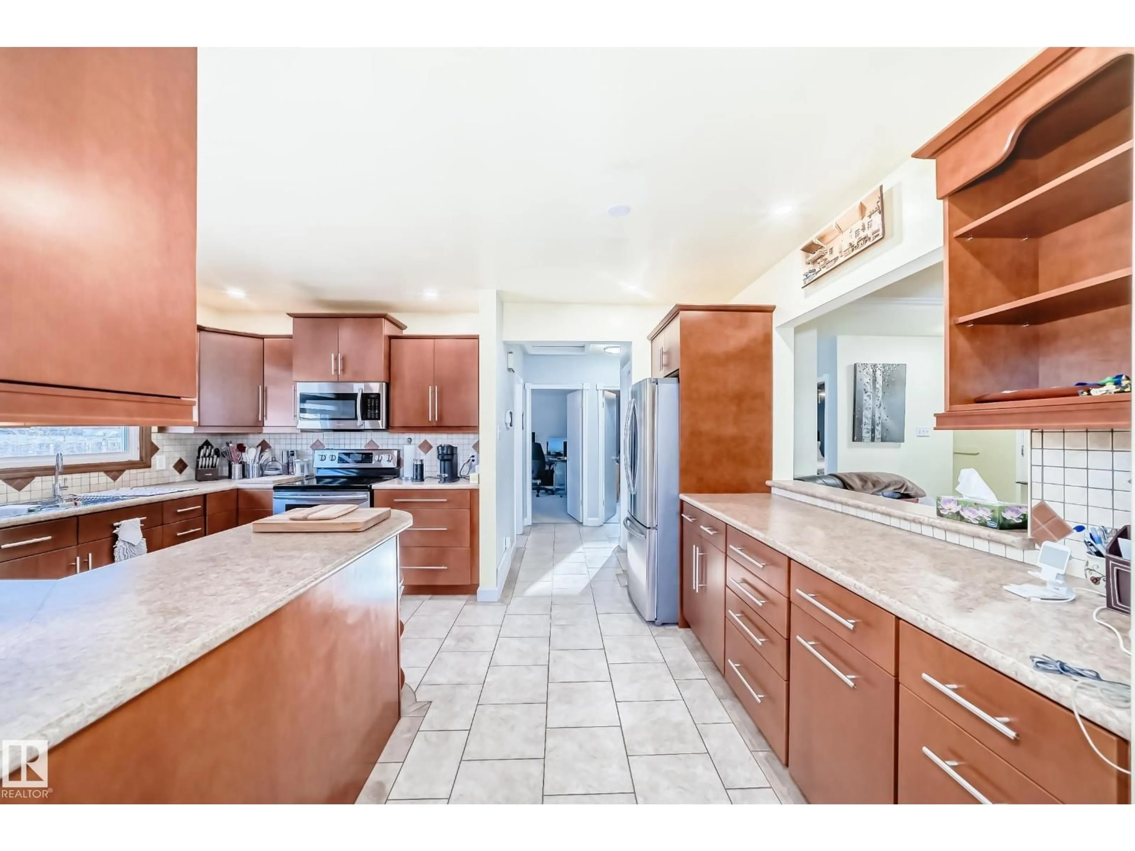 Open concept kitchen, ceramic/tile floor for 4446 116 AV, Edmonton Alberta T5W0X3