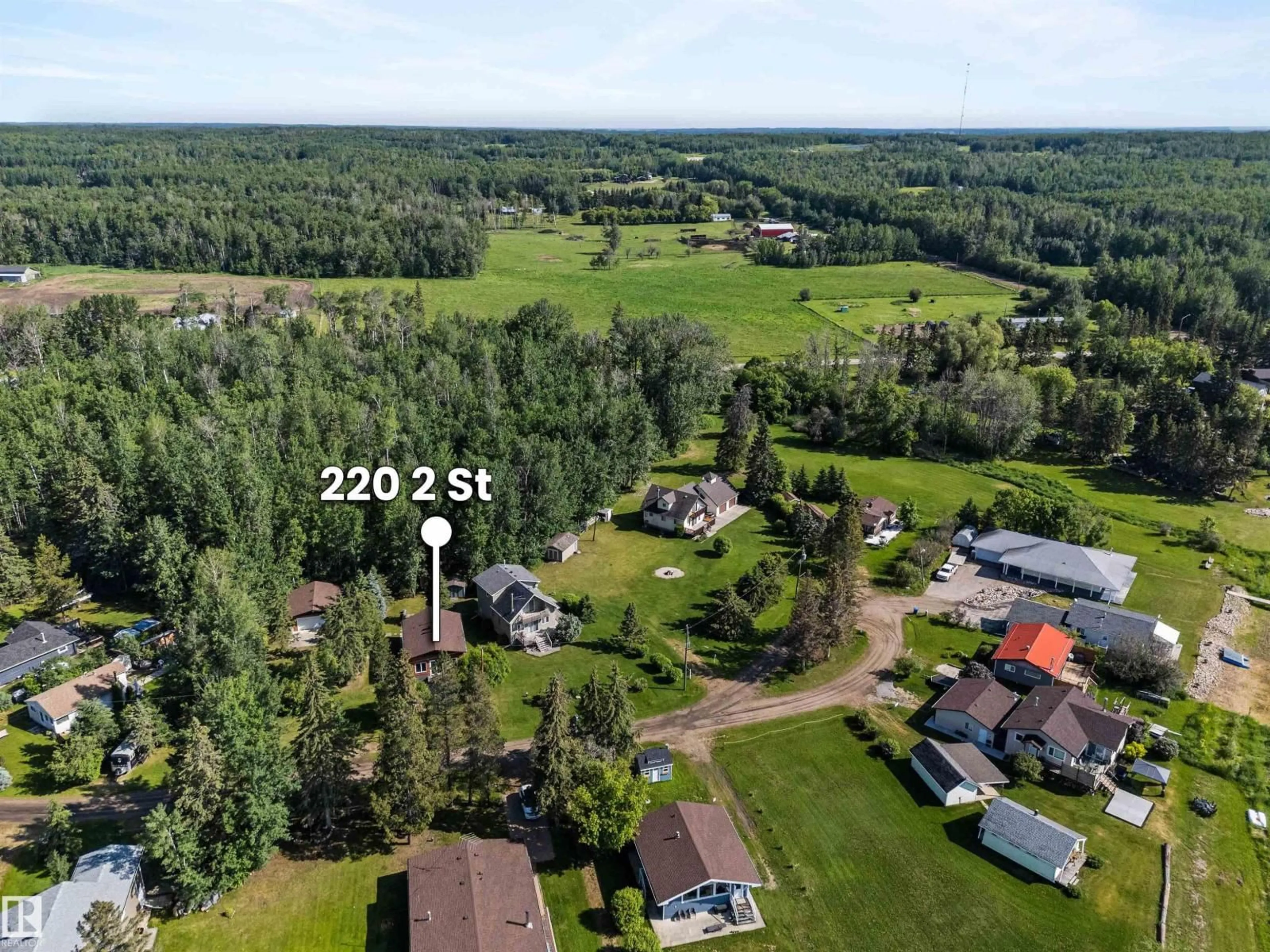 A pic from outside/outdoor area/front of a property/back of a property/a pic from drone, unknown for 220 2 ST, Rural Lac Ste. Anne County Alberta T0E1A0