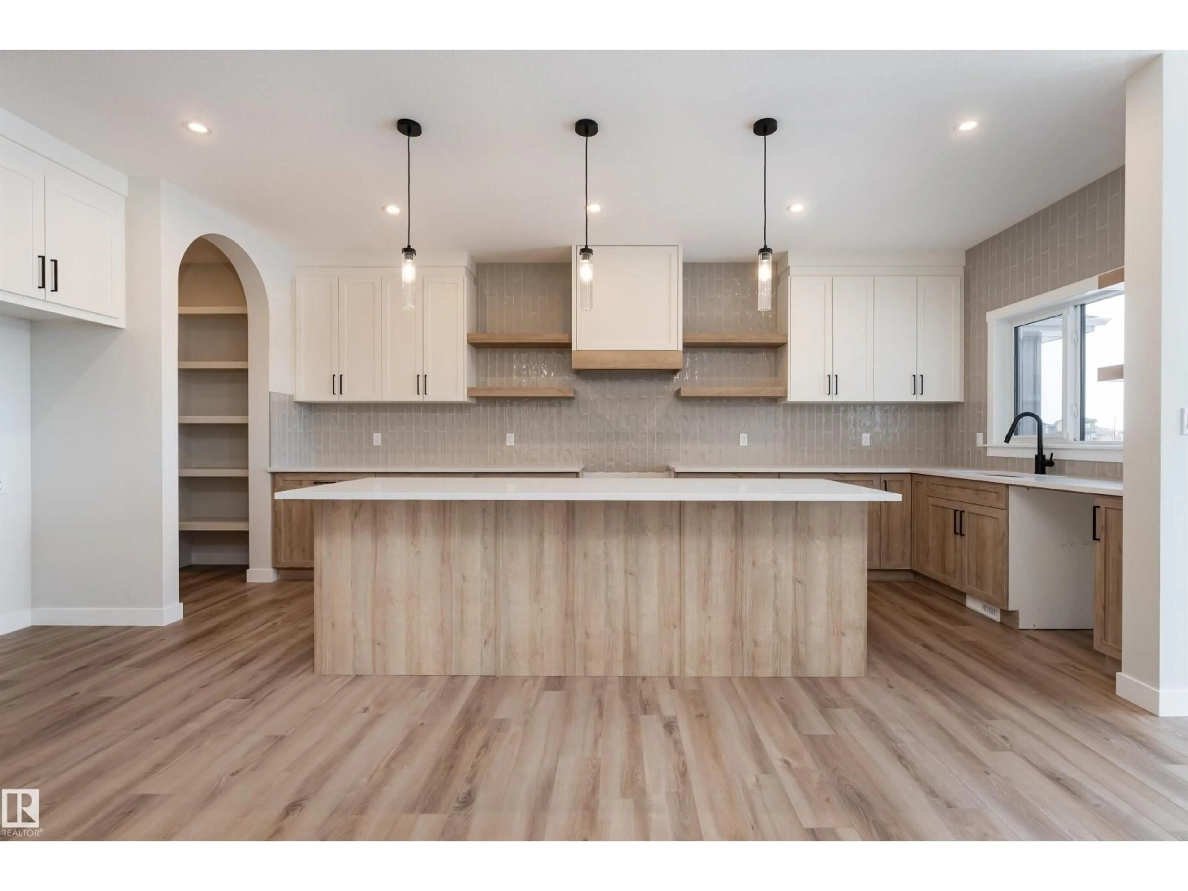 Open concept kitchen, wood/laminate floor for 8 TENUTO LI, Spruce Grove Alberta T7X3M7