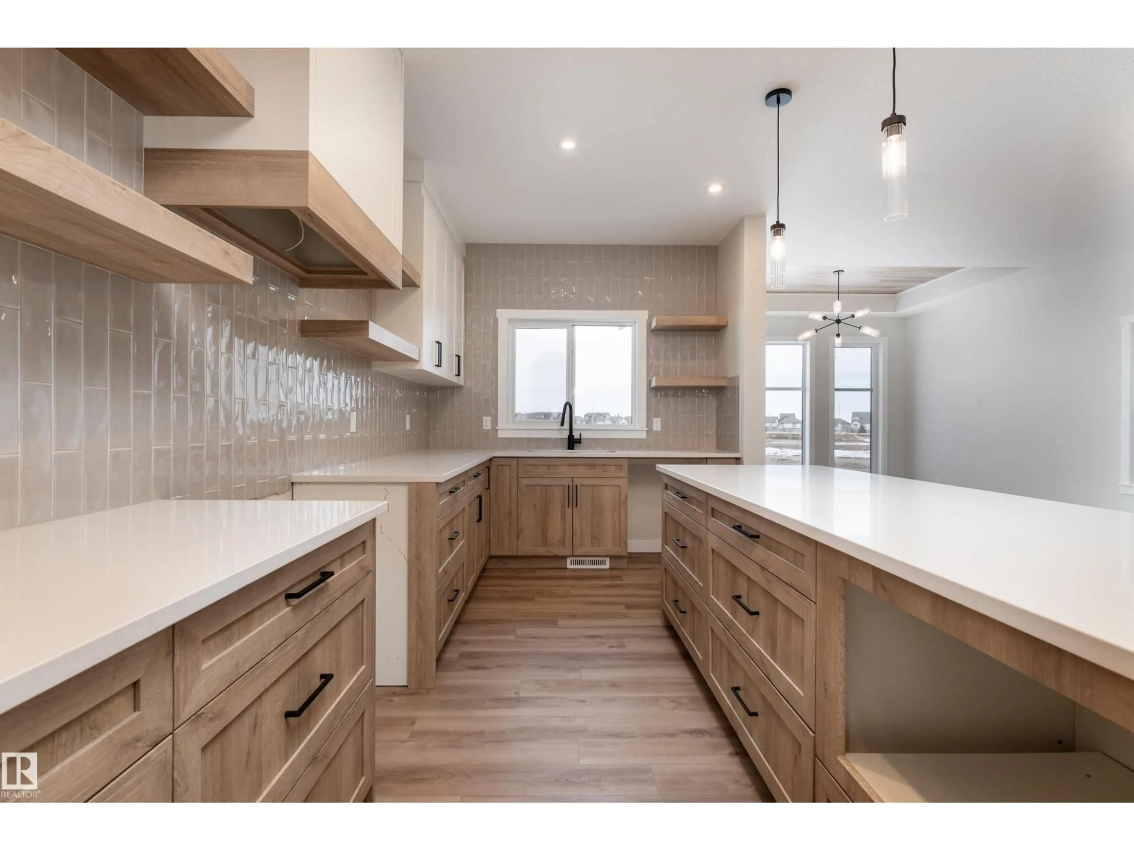 Open concept kitchen, wood/laminate floor for 8 TENUTO LI, Spruce Grove Alberta T7X3M7