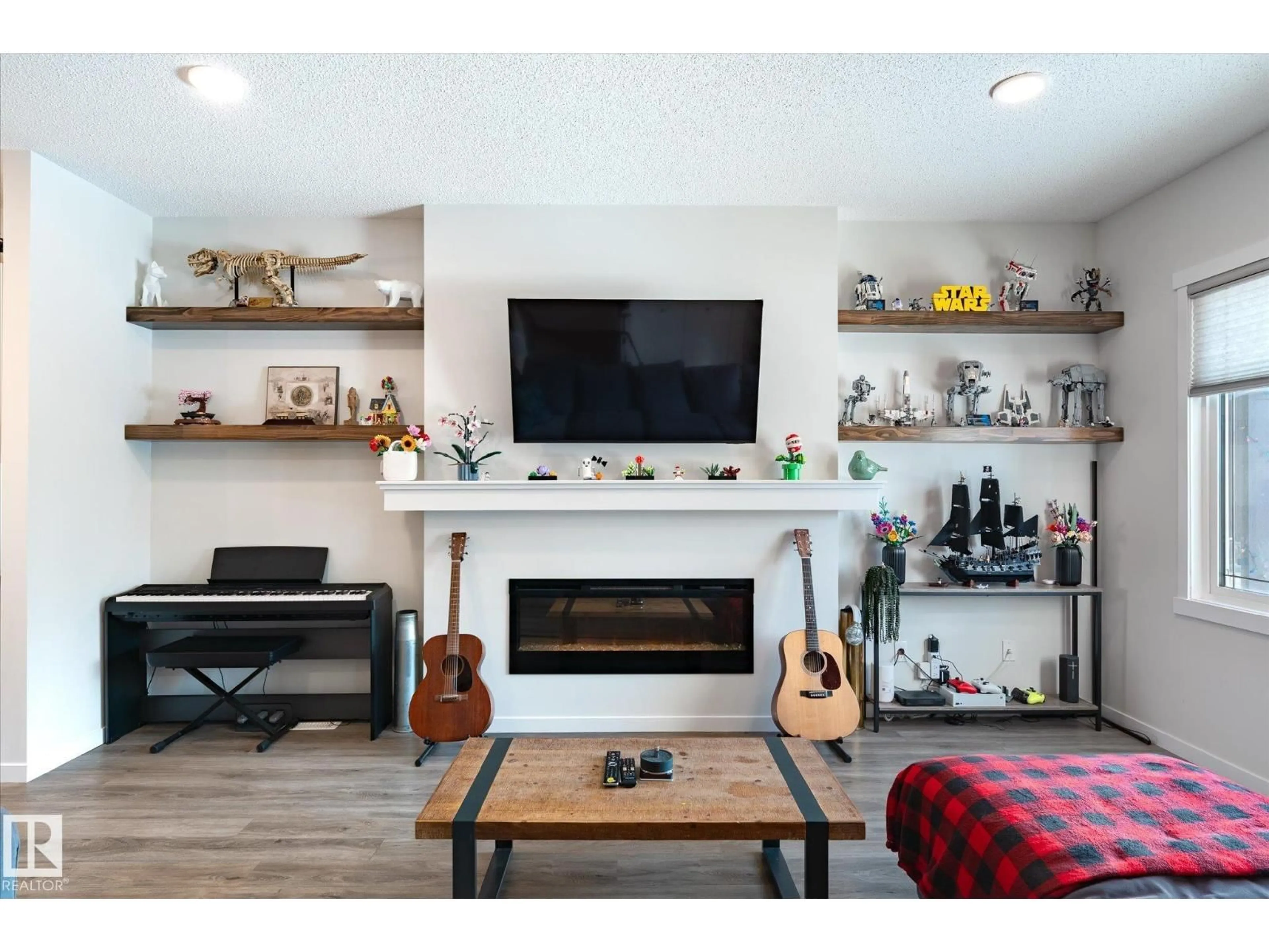 Living room with furniture, wood/laminate floor for 17487 77 ST, Edmonton Alberta T5Z0R4