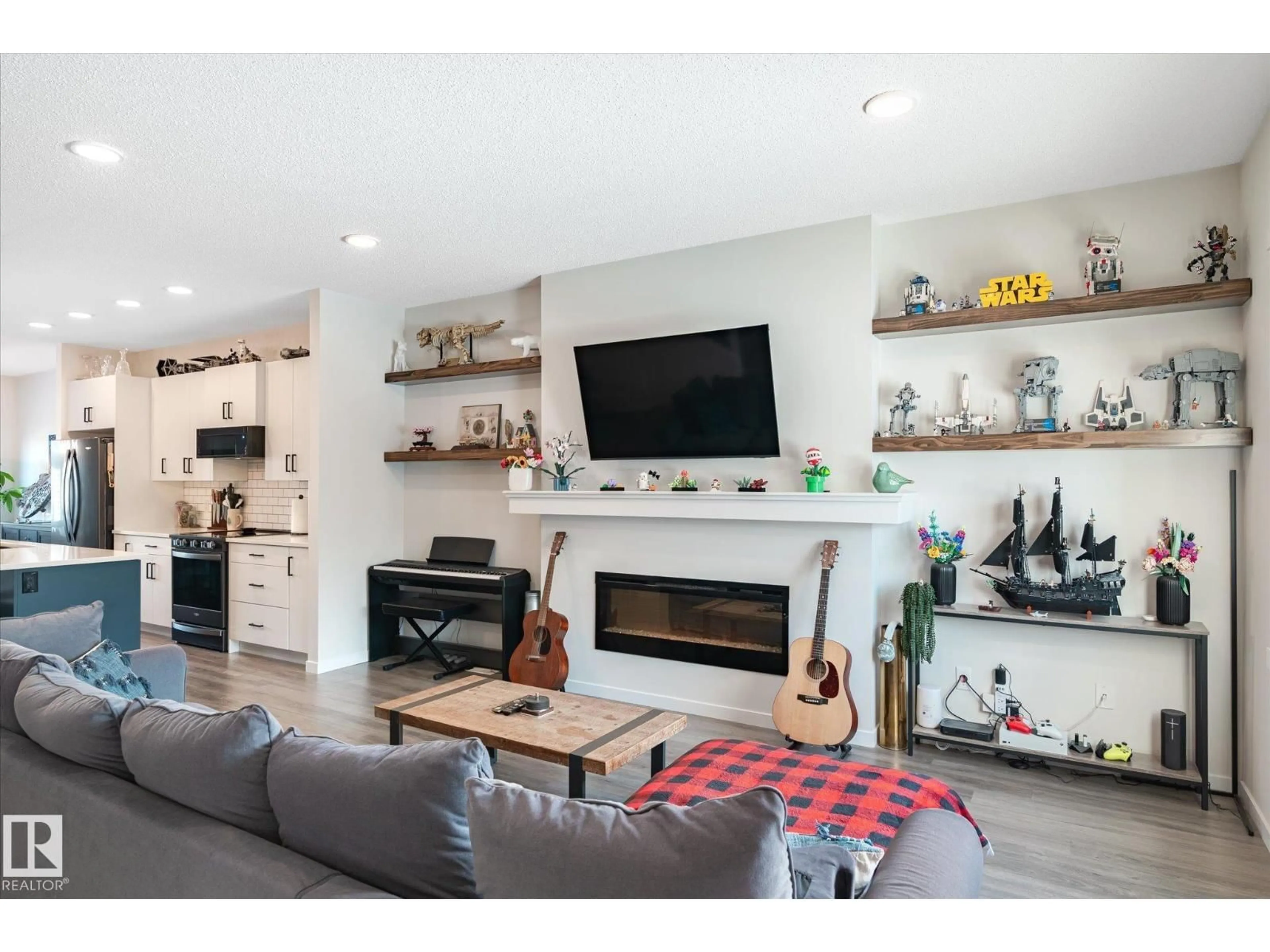 Living room with furniture, wood/laminate floor for 17487 77 ST, Edmonton Alberta T5Z0R4