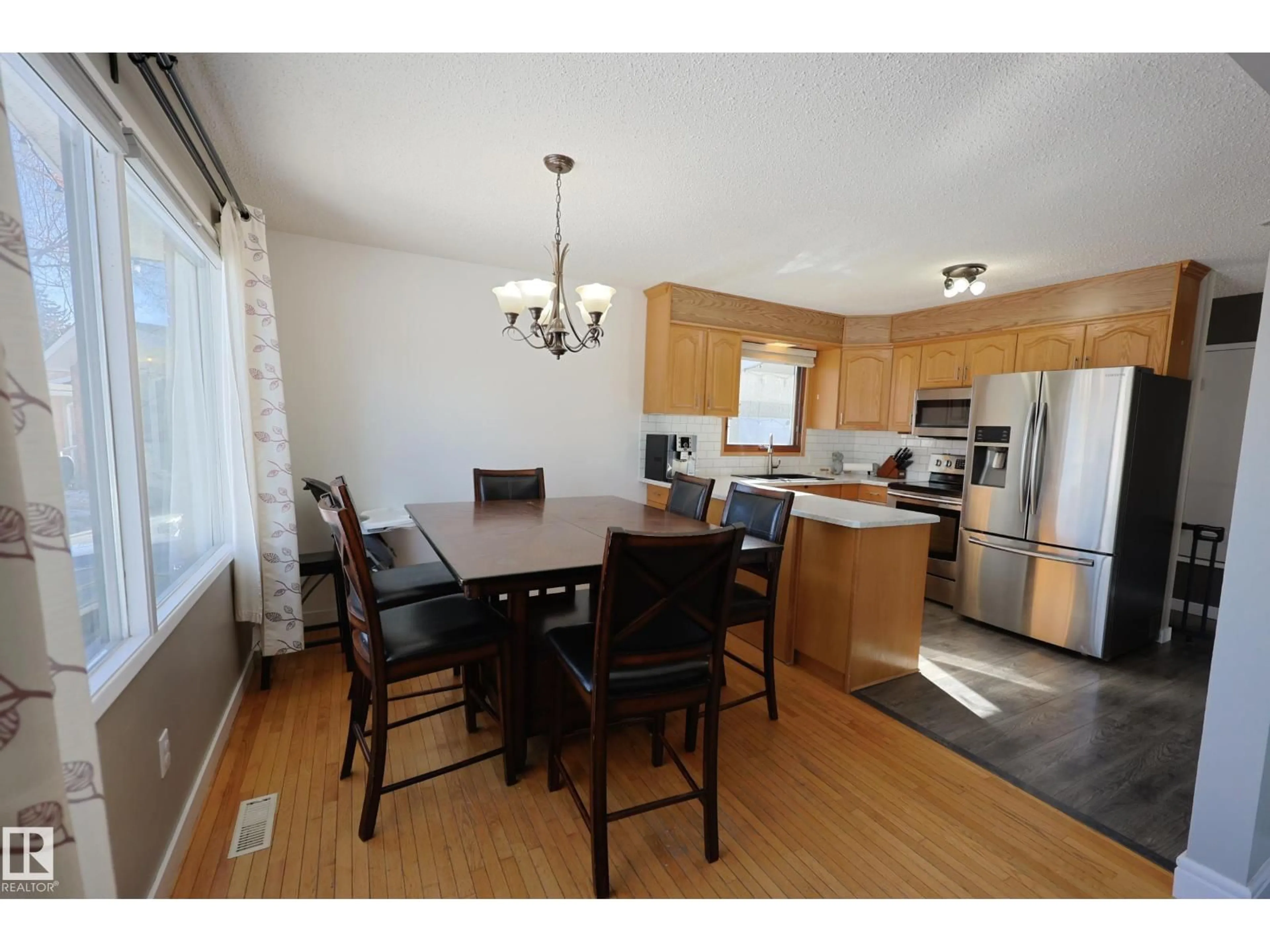 Open concept kitchen, wood/laminate floor for 37 ARMSTRONG CR, Leduc Alberta T9E5G1