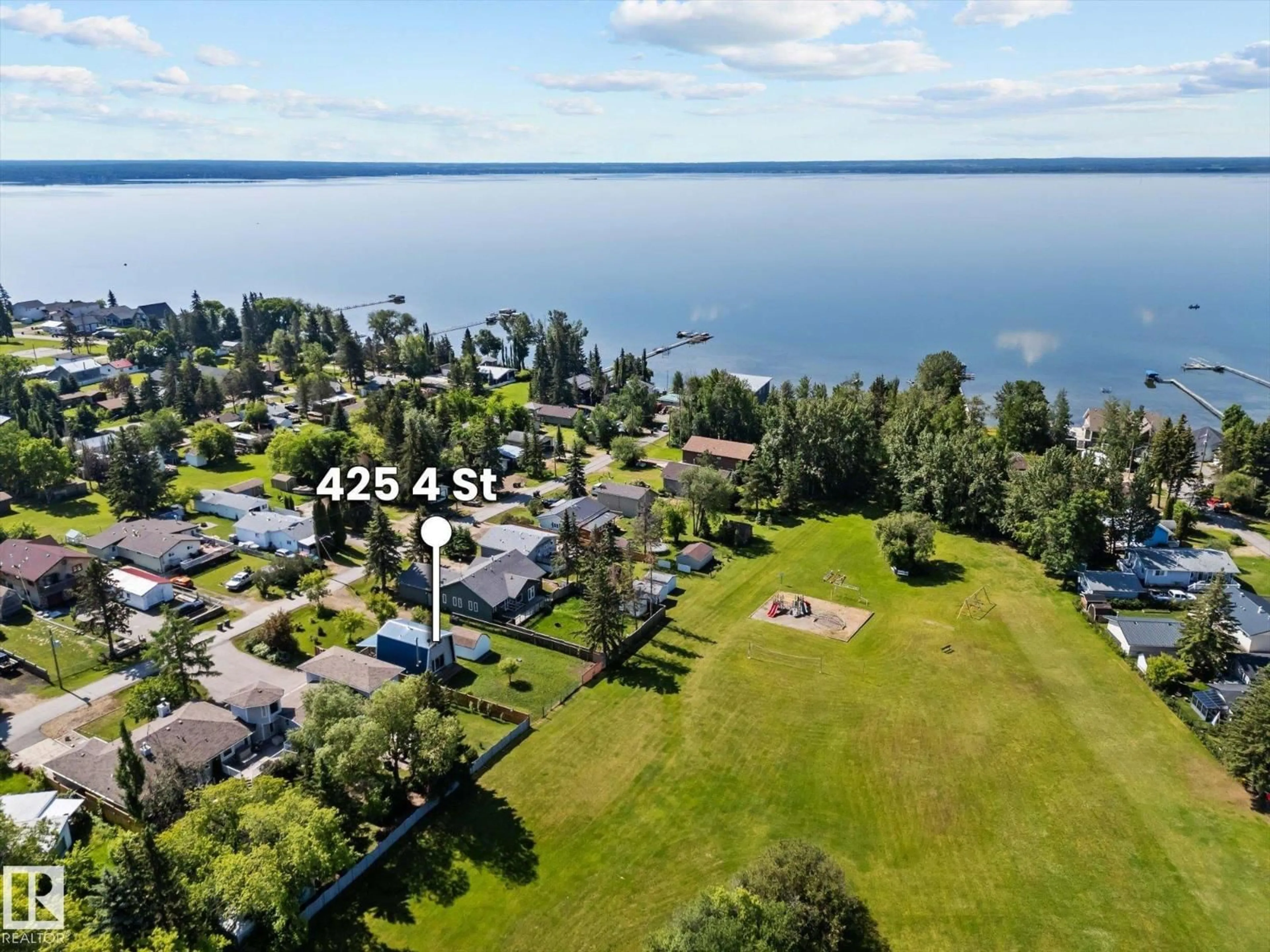 A pic from outside/outdoor area/front of a property/back of a property/a pic from drone, water/lake/river/ocean view for 425 4 ST, Rural Lac Ste. Anne County Alberta T0E0A0