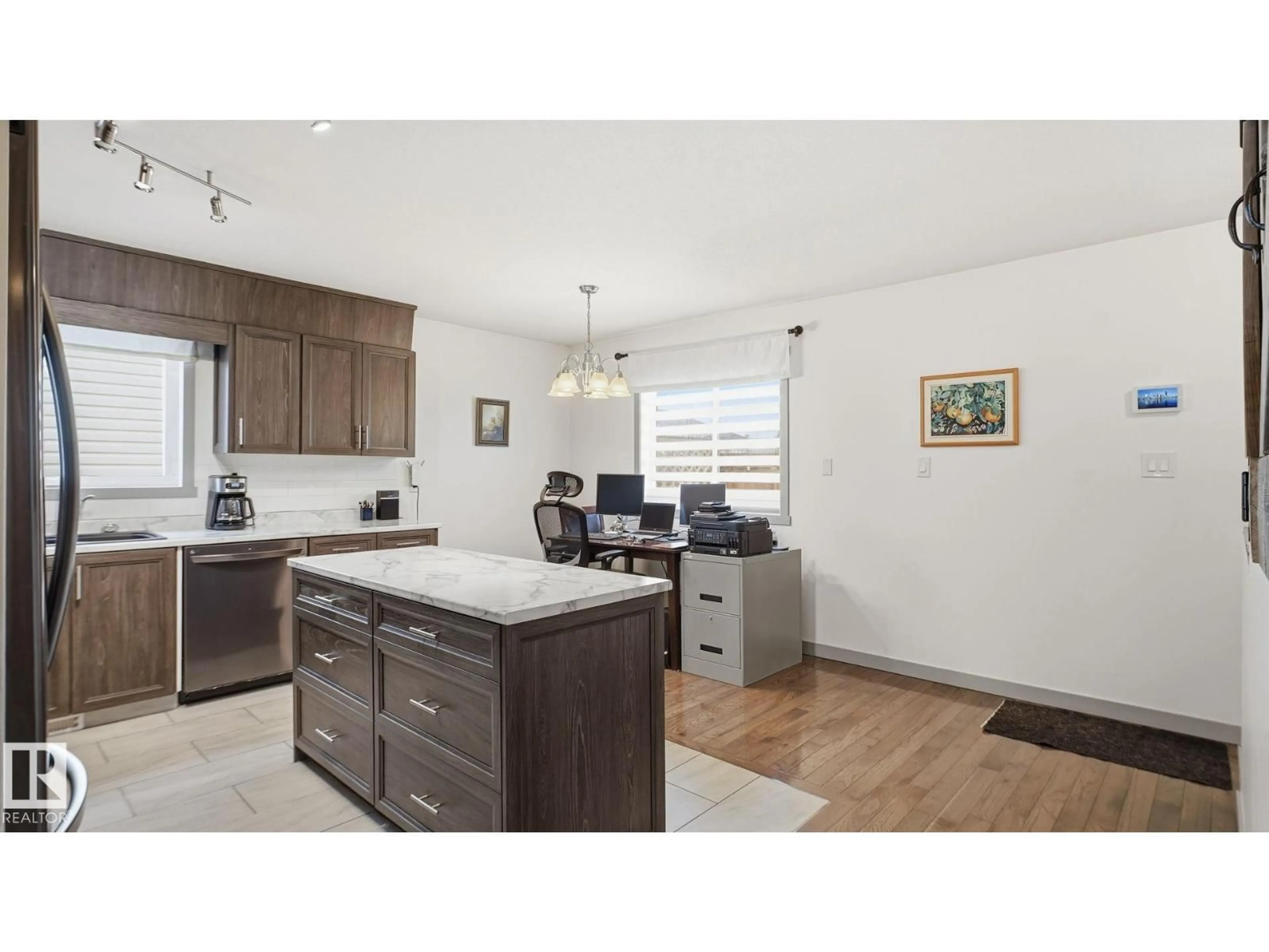 Open concept kitchen, wood/laminate floor for 5107 57 AV, Stony Plain Alberta T7Z1A5