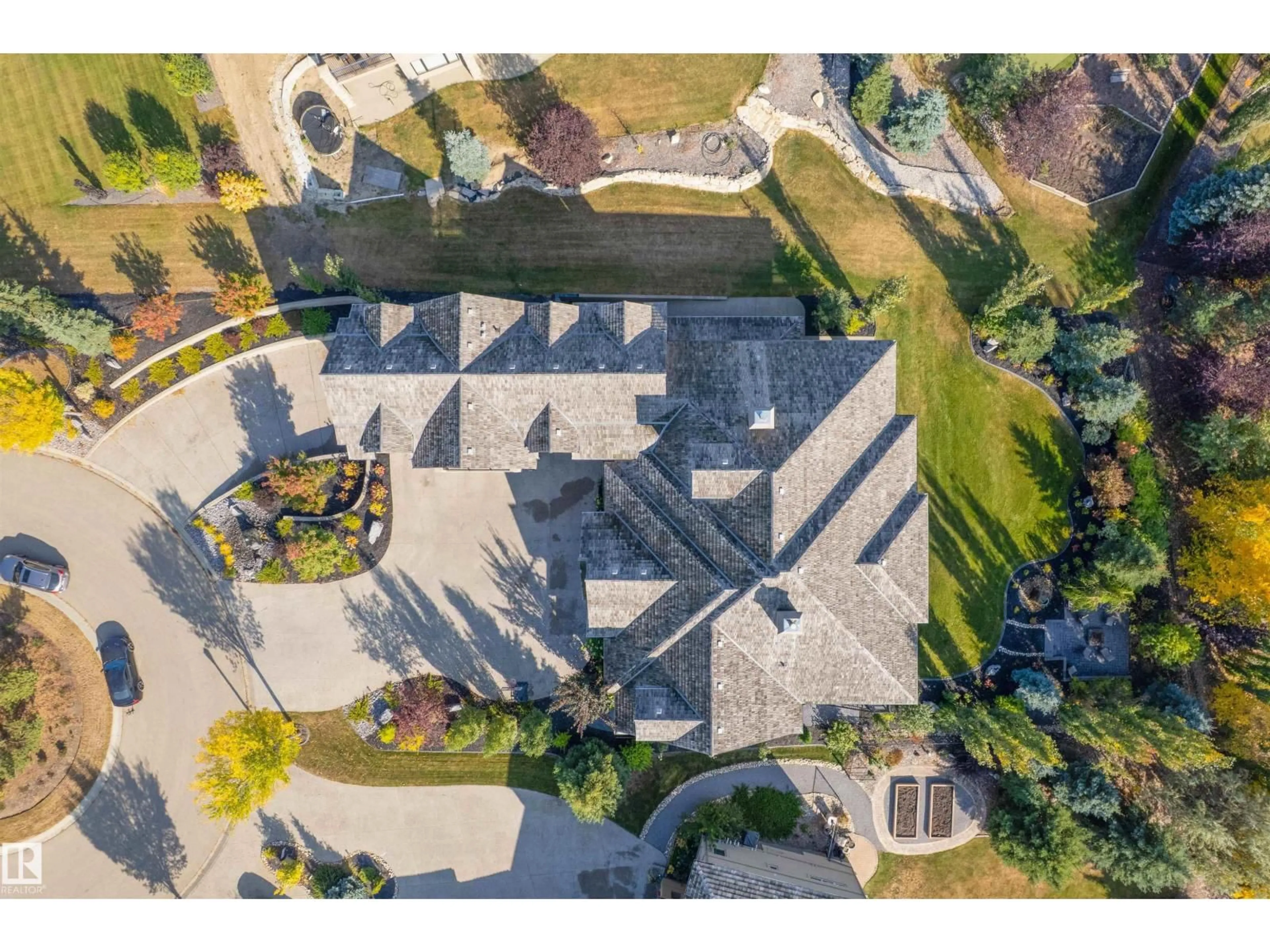 A pic from outside/outdoor area/front of a property/back of a property/a pic from drone, street for 54403 - 43 RGE ROAD 251, Rural Sturgeon County Alberta T8T0B5