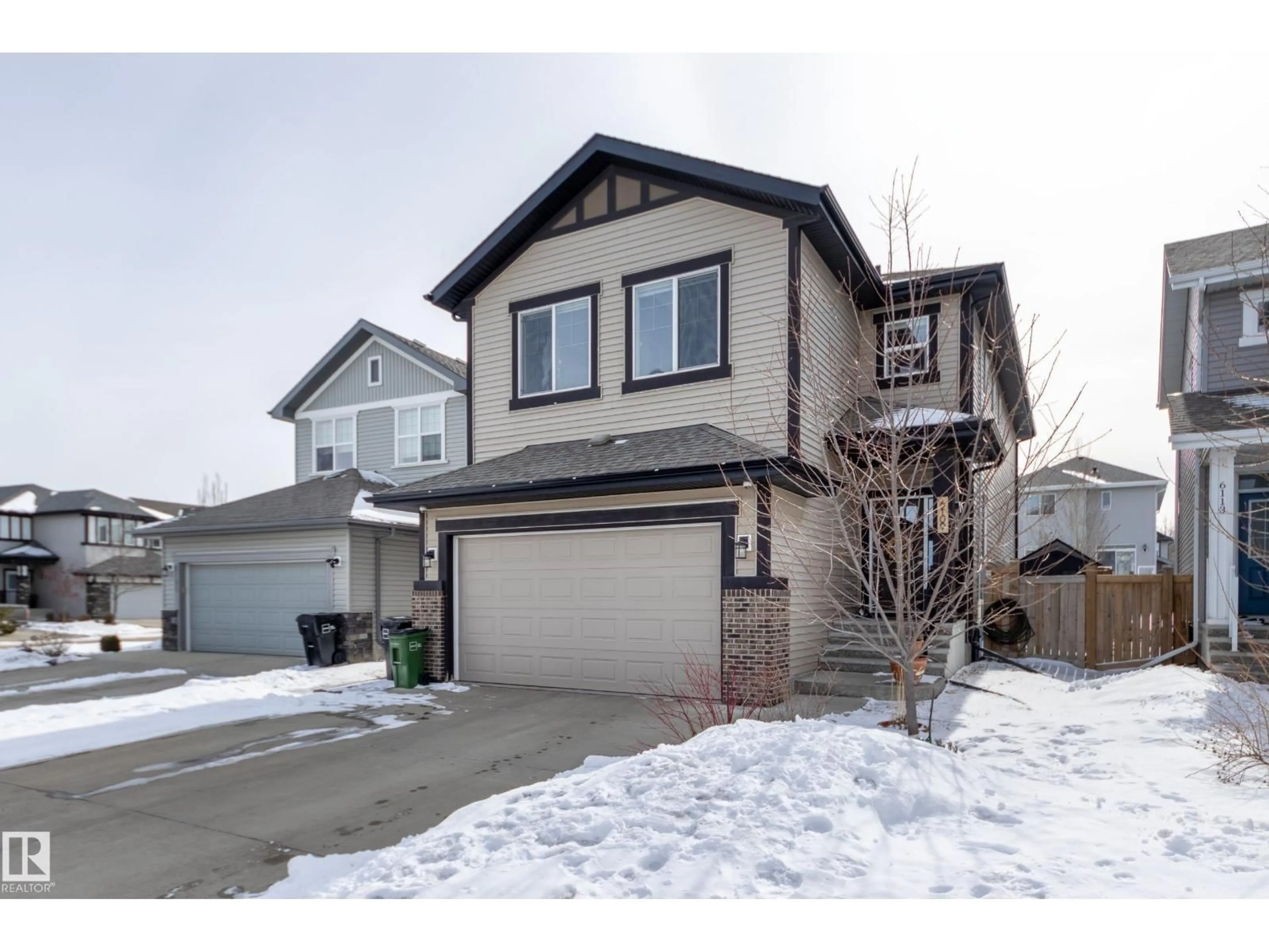 Home with vinyl exterior material, street for 6109 175A AV, Edmonton Alberta T5Y3N8