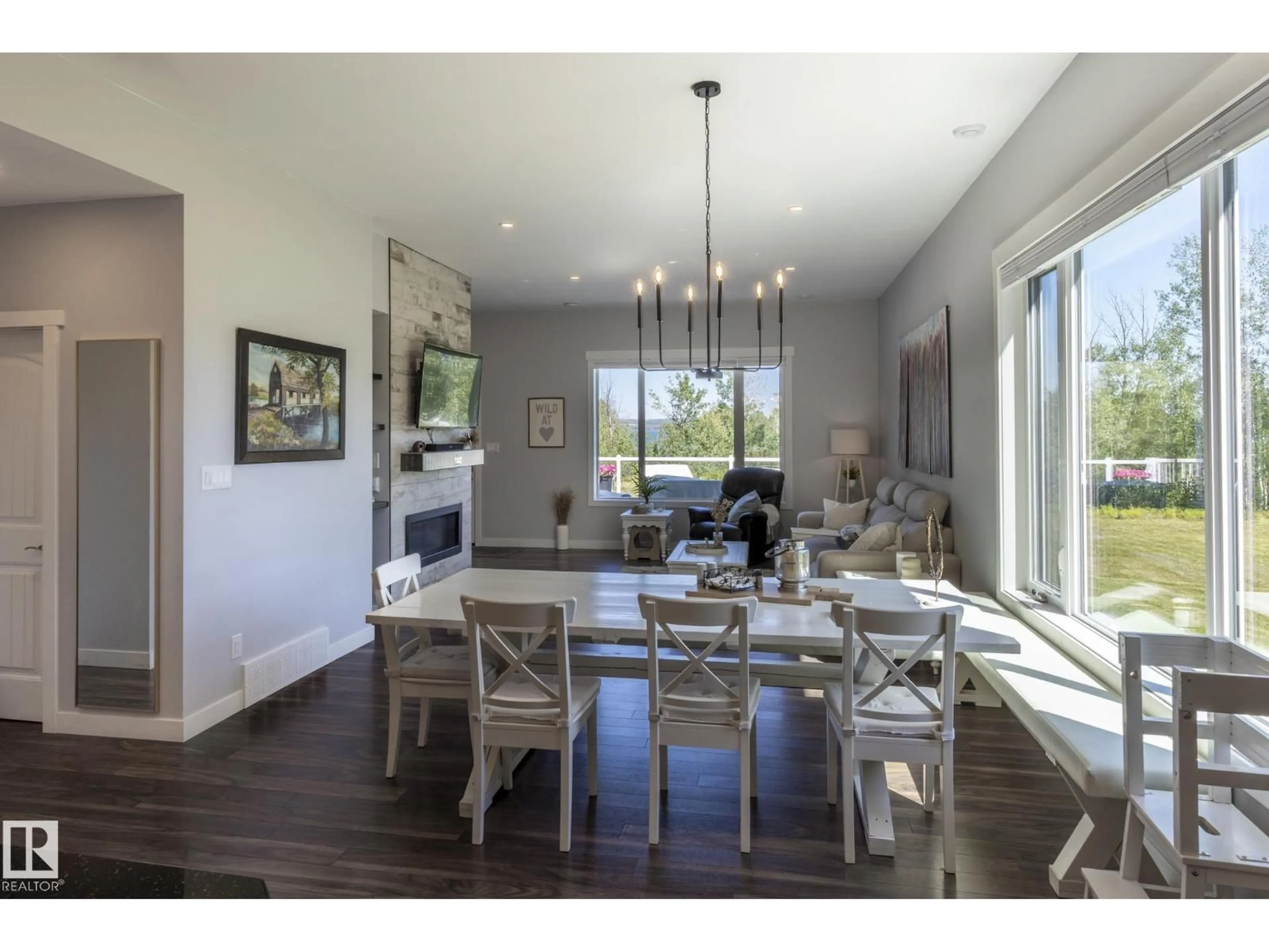 Dining room, wood/laminate floor for 14 KOS ST, Rural Parkland County Alberta T0E2B0