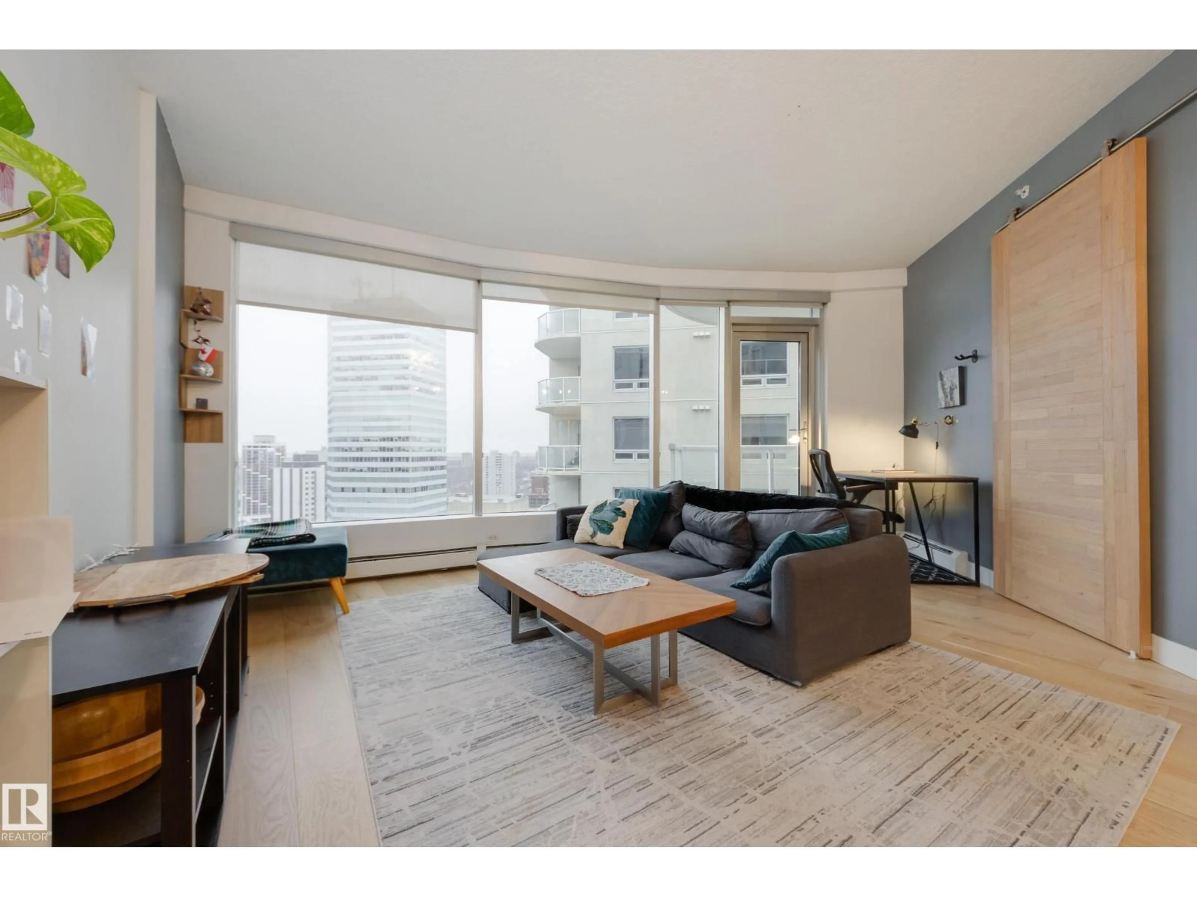 Living room with furniture, unknown for 10152 - 2004 104 ST, Edmonton Alberta T5J0B6