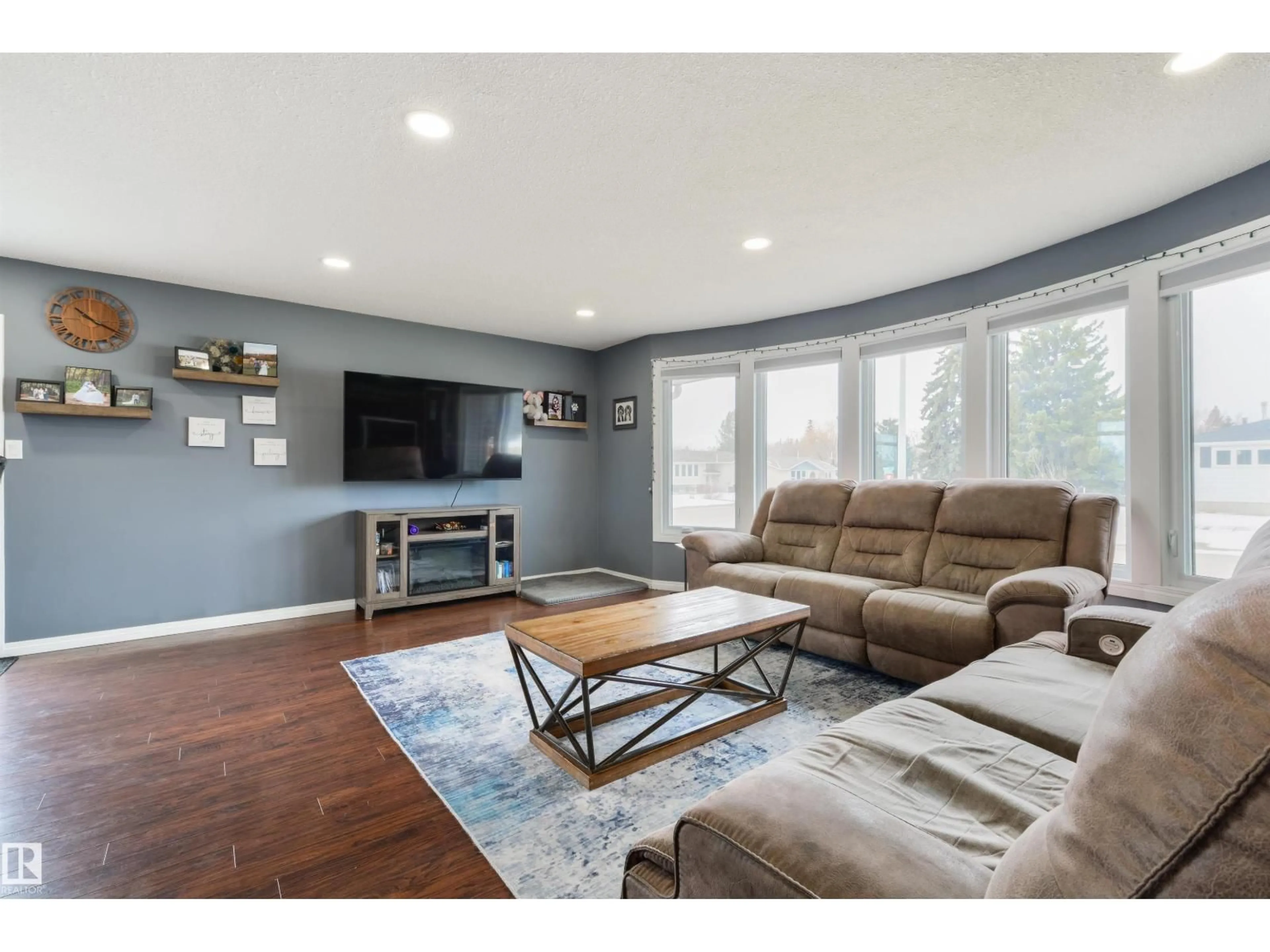 Living room with furniture, wood/laminate floor for 114 WAVERLEY CR, Spruce Grove Alberta T7X1P2