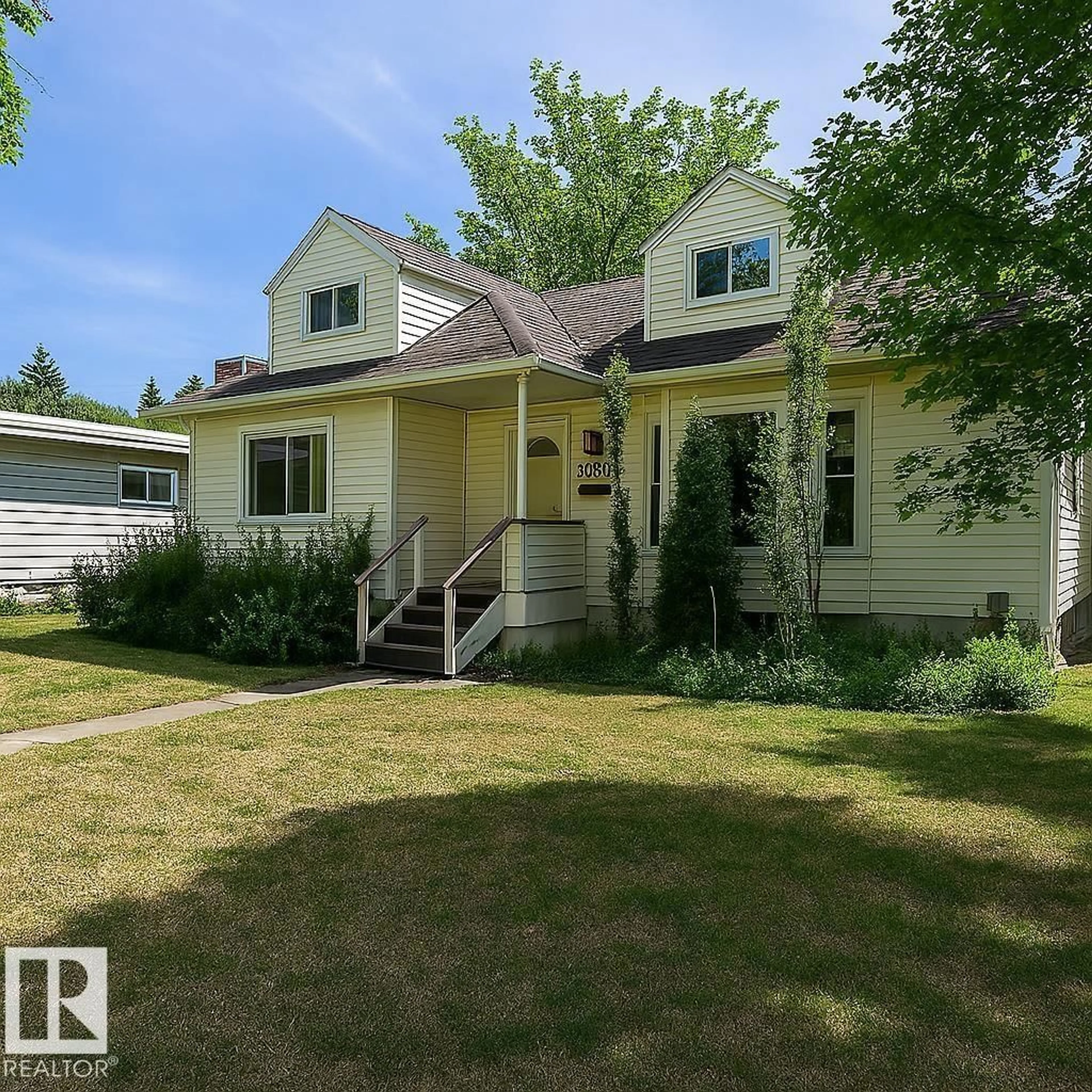 Home with vinyl exterior material, street for NW - 8935 117 ST, Edmonton Alberta T6G1R8