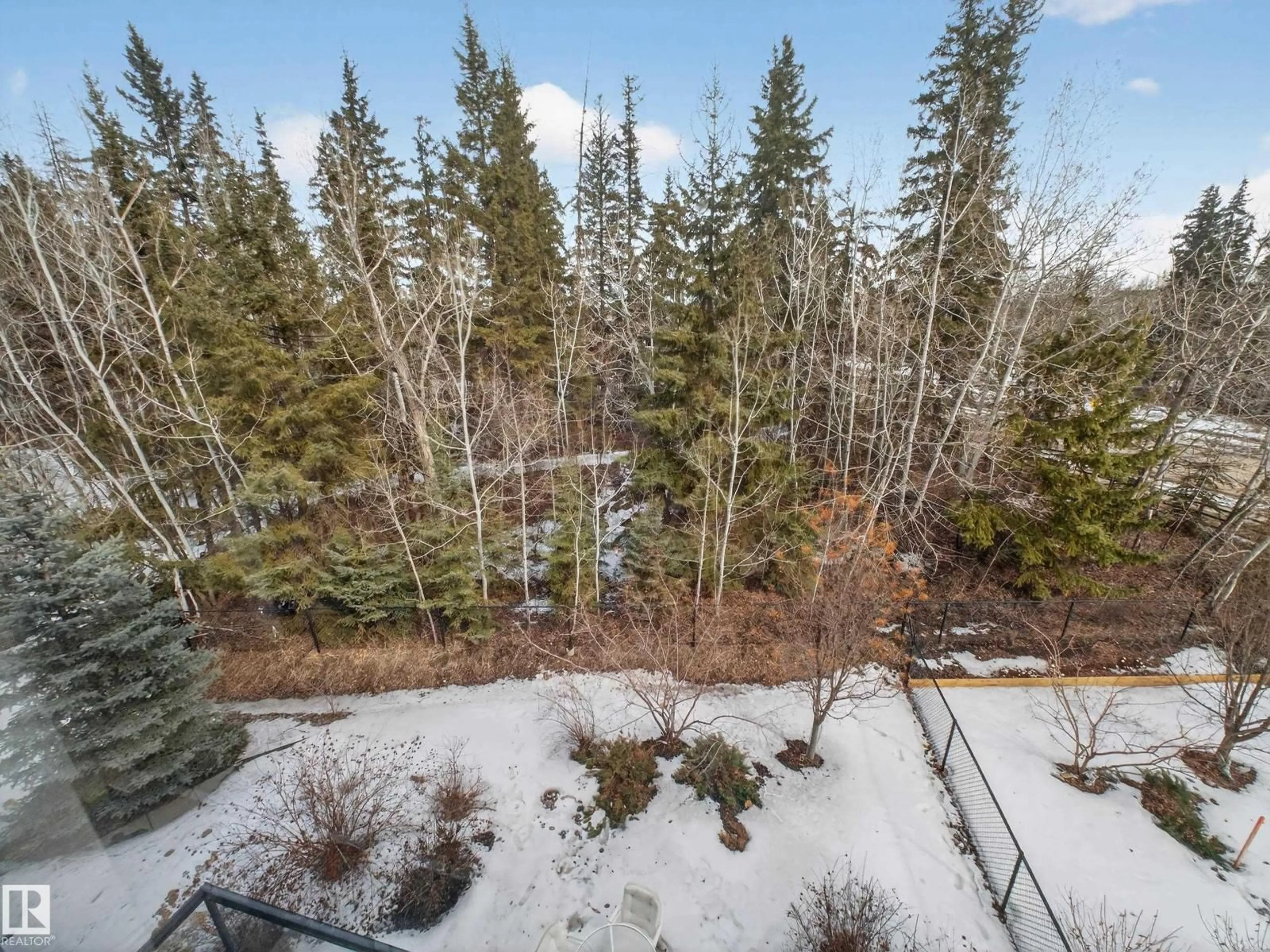 A pic from outside/outdoor area/front of a property/back of a property/a pic from drone, forest/trees view for #5 - 1304 RUTHERFORD RD, Edmonton Alberta T6W0B4