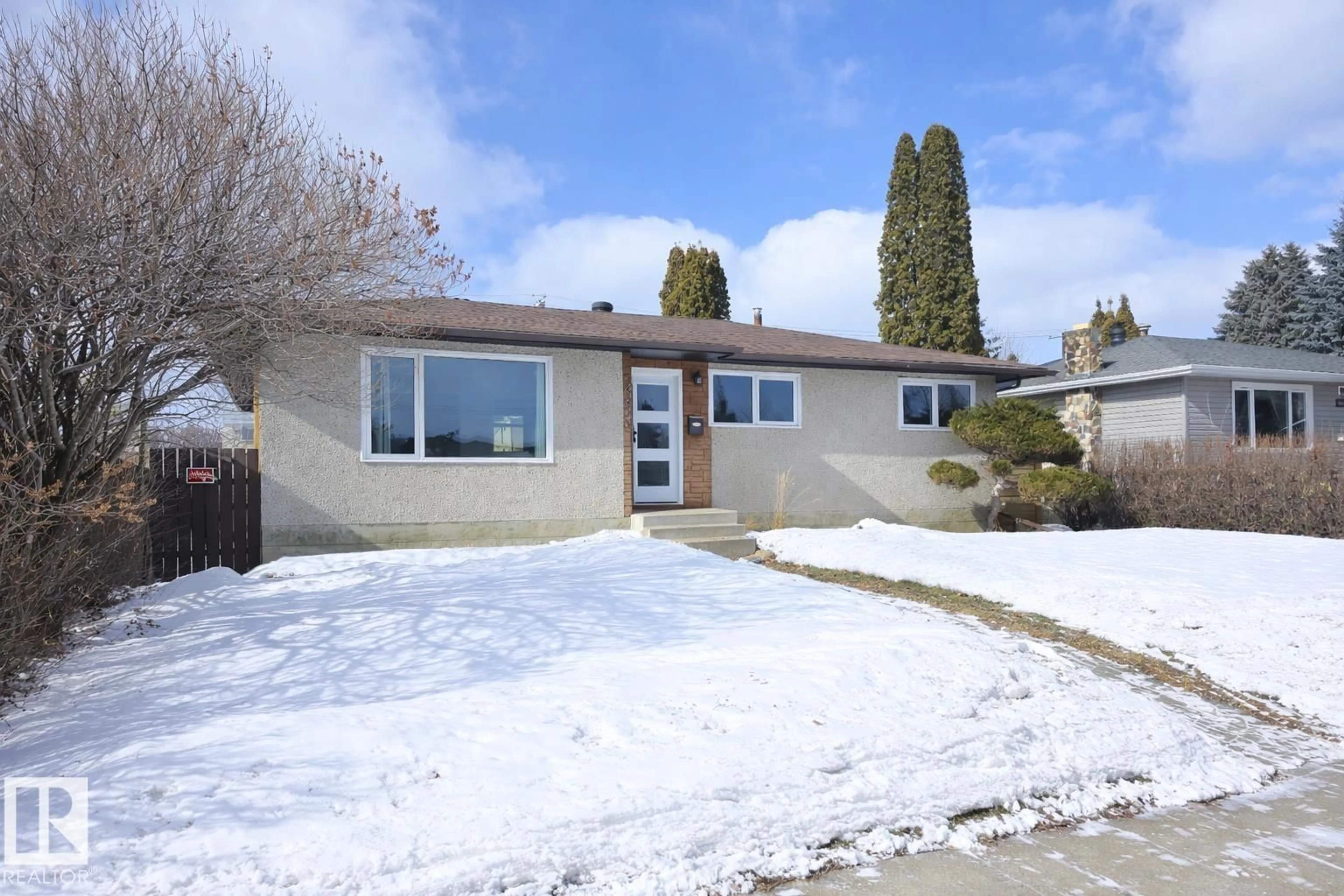 Home with vinyl exterior material, street for NW - 4820 105B ST, Edmonton Alberta T6H2S1