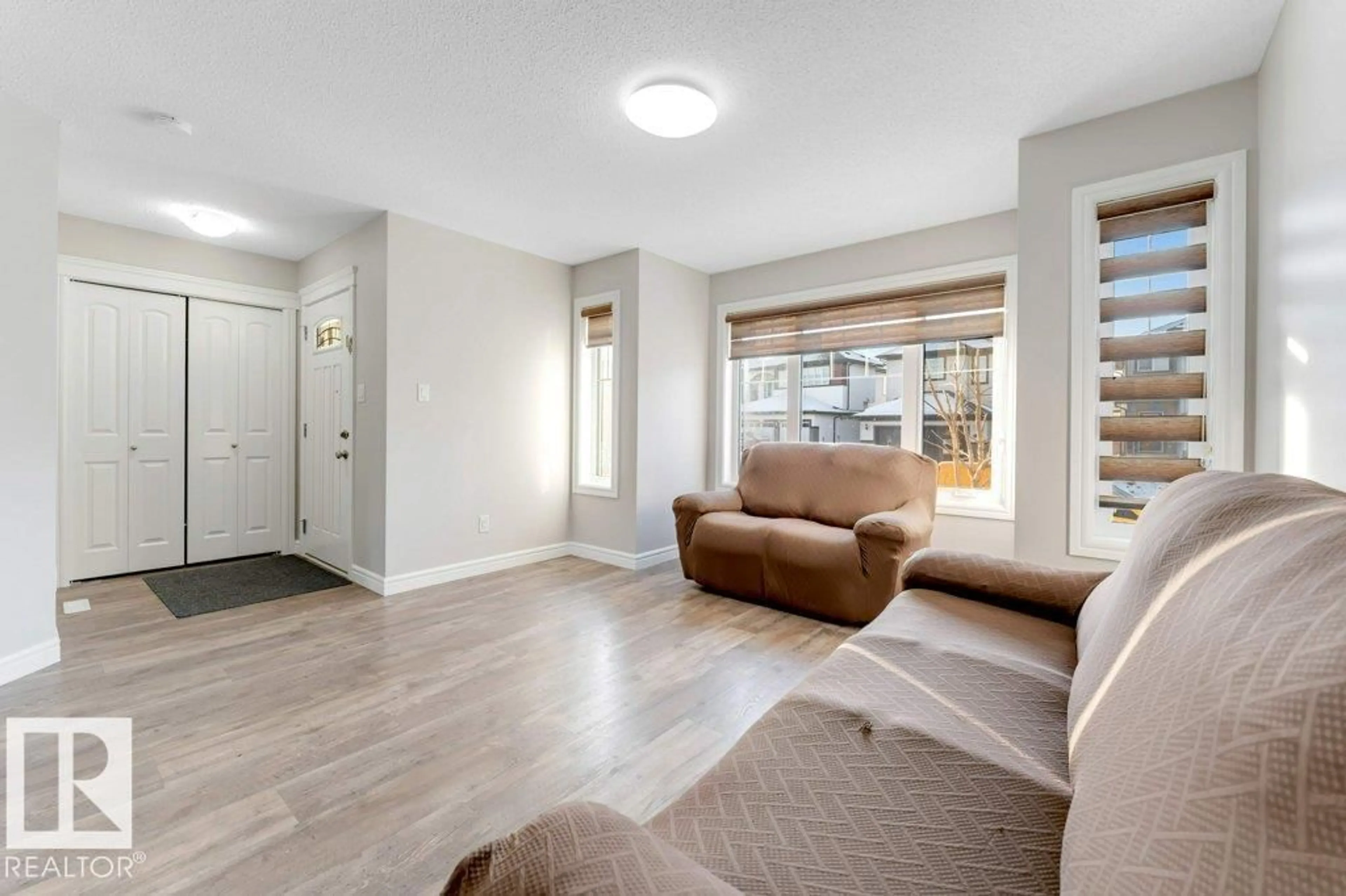 Living room with furniture, unknown for NW - 1423 24 ST, Edmonton Alberta T6T2J7