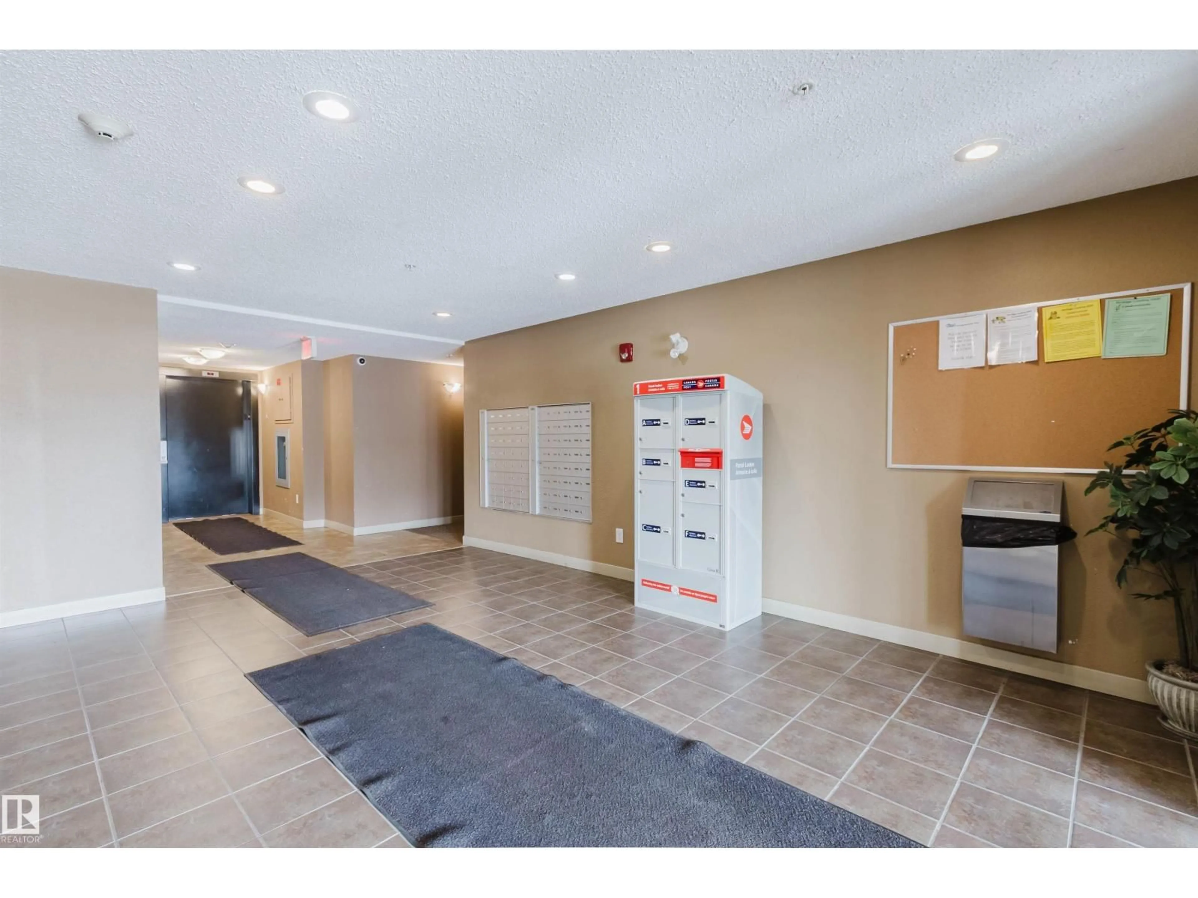 Indoor foyer for #204 - 11803 22 AV, Edmonton Alberta T6W2R9