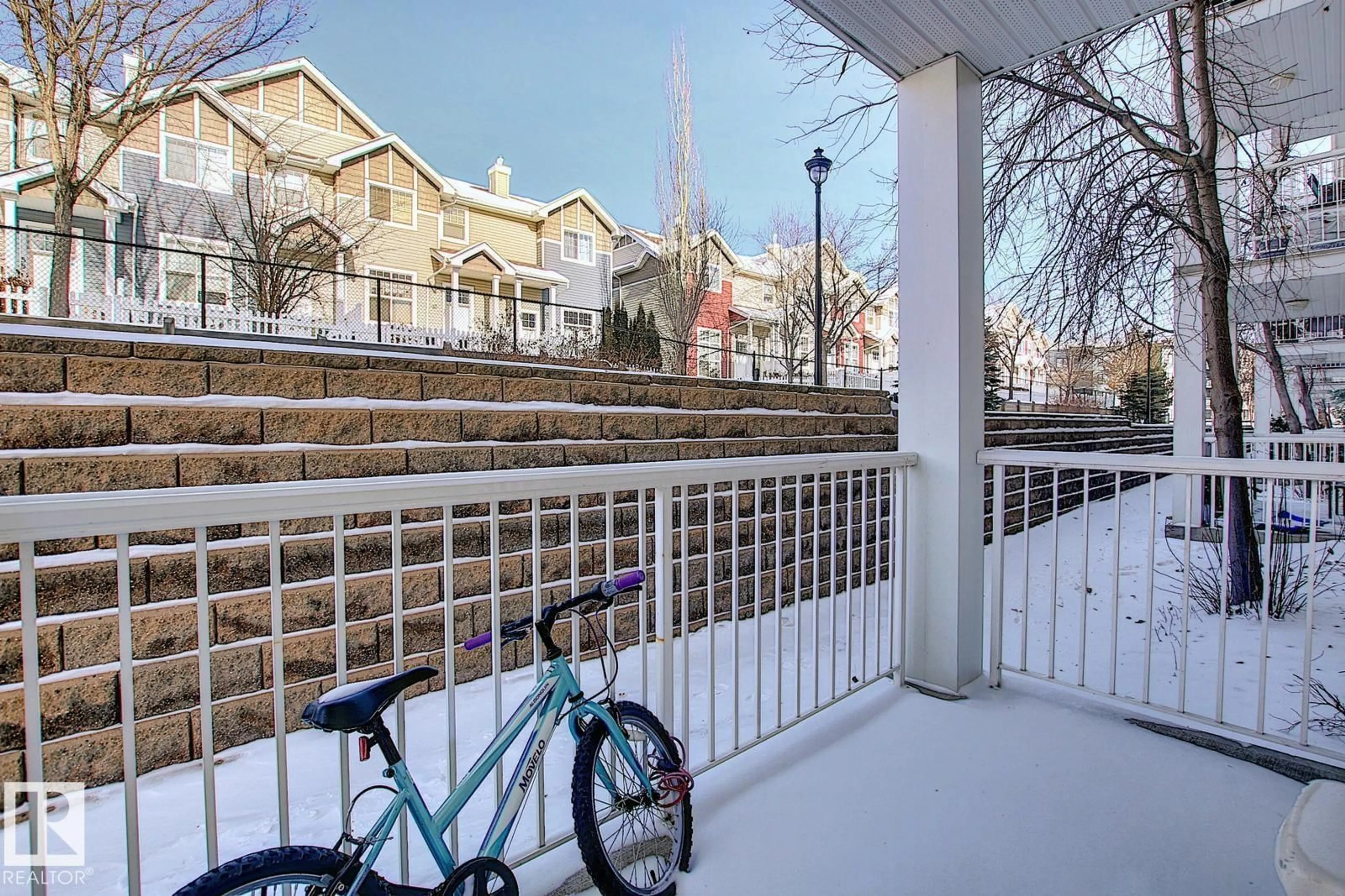 Patio, city buildings view from balcony for #118 - 5350 199 ST, Edmonton Alberta T6M0A4