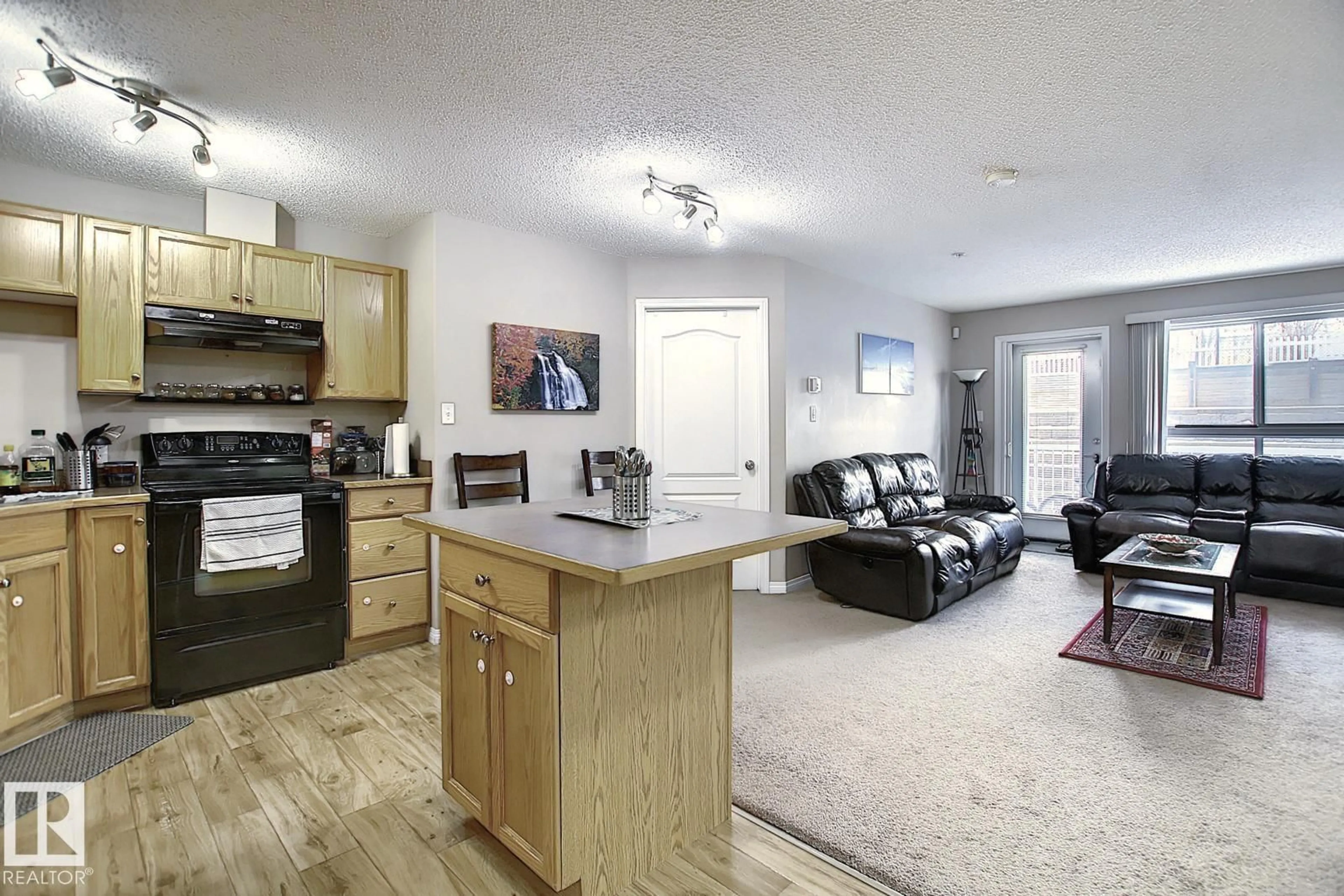 Open concept kitchen, unknown for #118 - 5350 199 ST, Edmonton Alberta T6M0A4