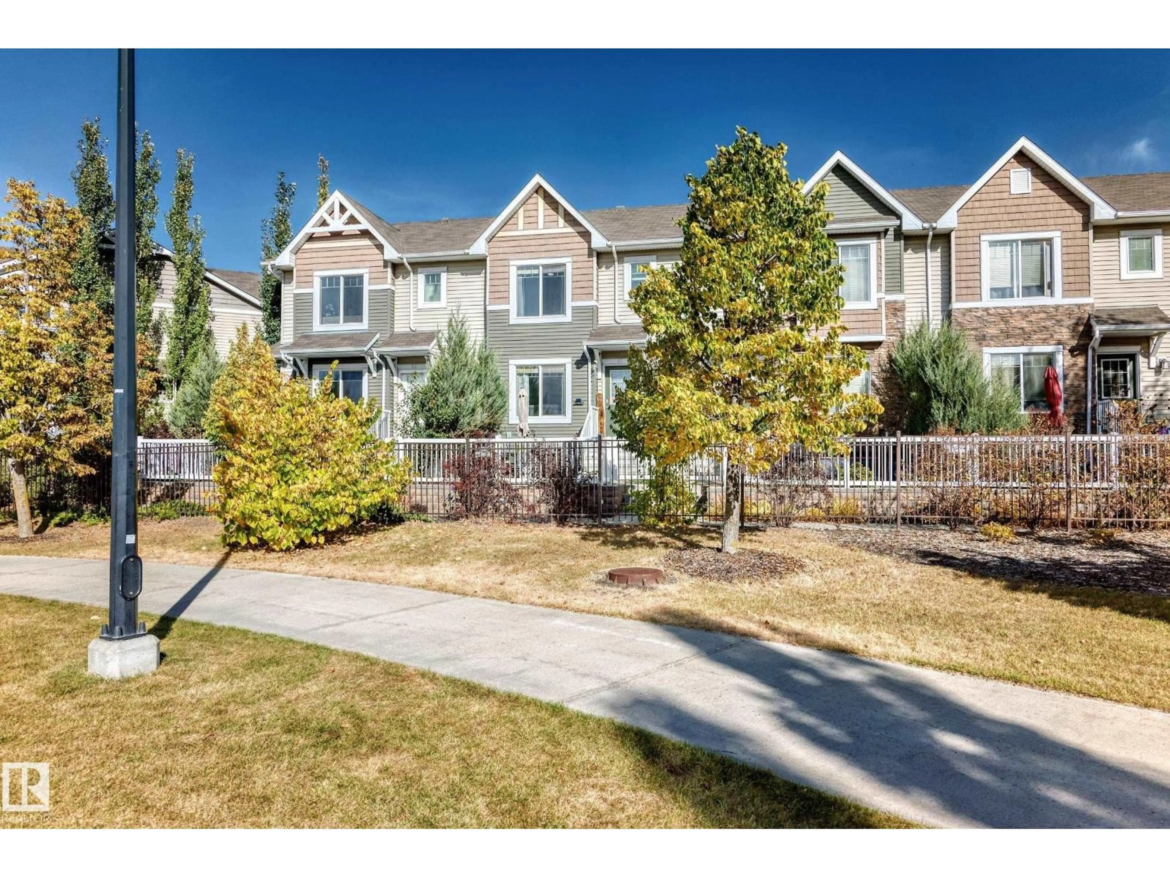 A pic from outside/outdoor area/front of a property/back of a property/a pic from drone, street for 63 - 3625 144 AV, Edmonton Alberta T5Y0T3