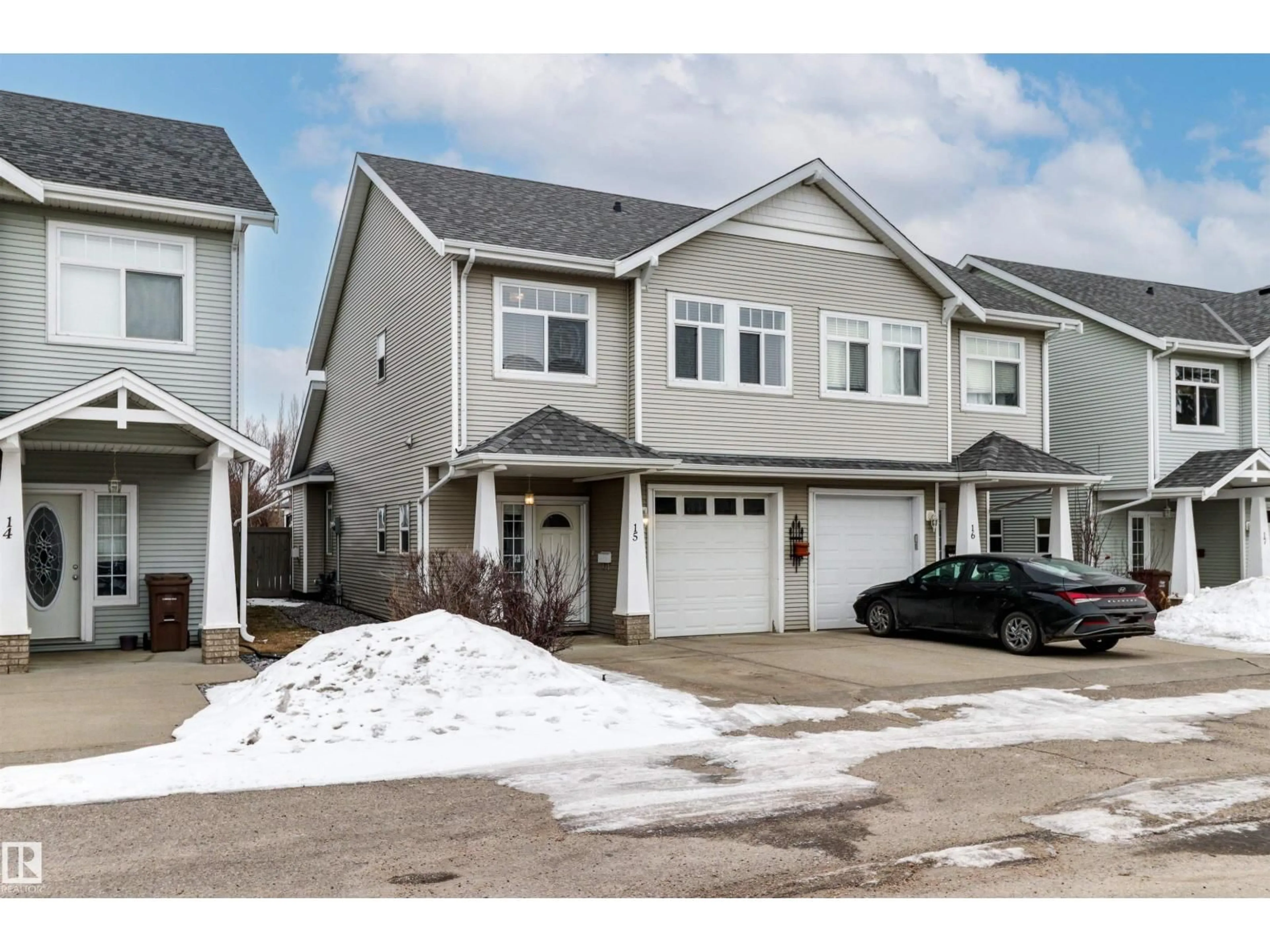 Home with vinyl exterior material, street for 15 - 15-200 ERIN RIDGE DR, St. Albert Alberta T8N7E2