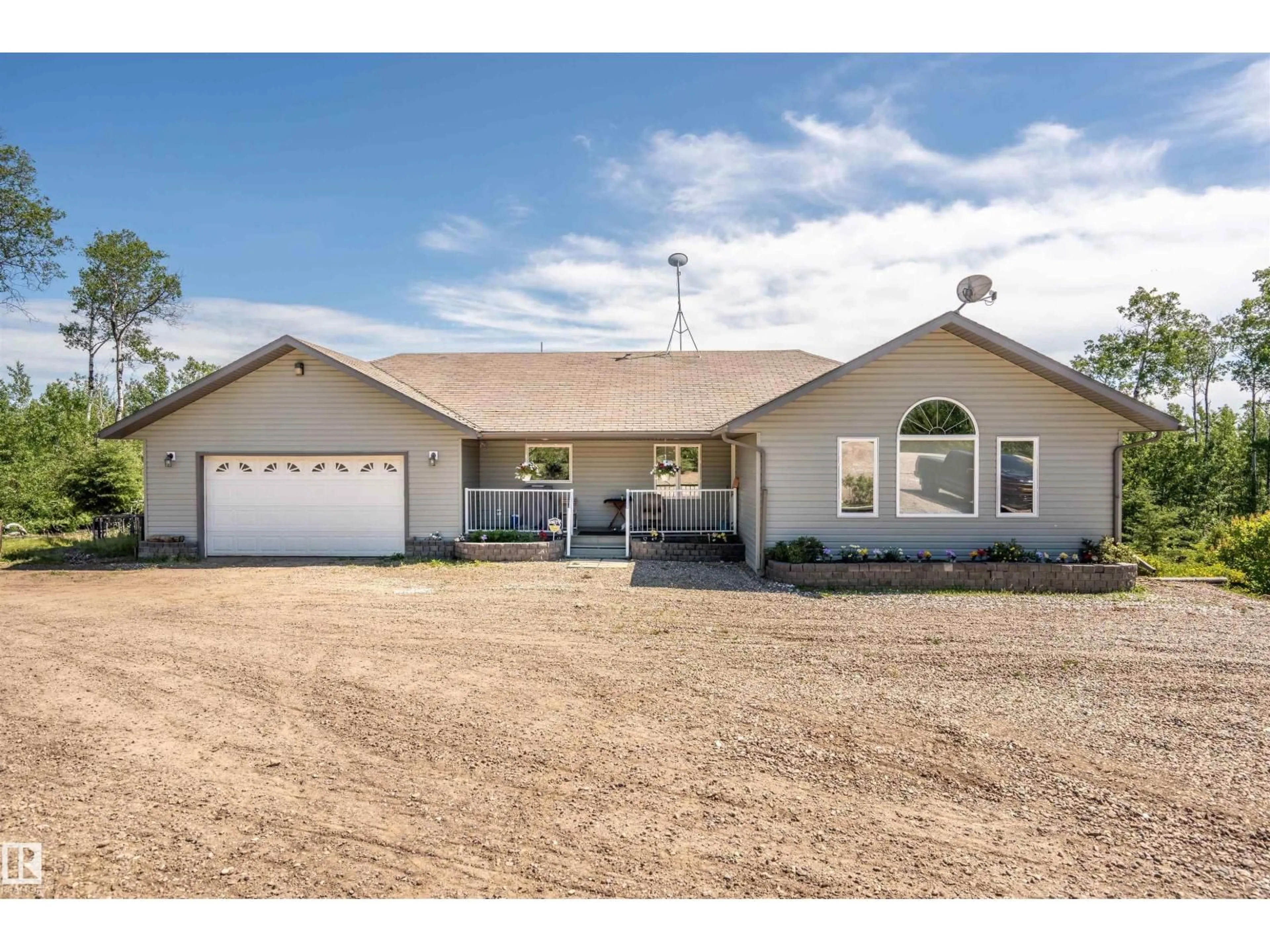 Home with vinyl exterior material, street for 62019 RANGE ROAD 421, Rural Bonnyville M.D. Alberta T9M1P2