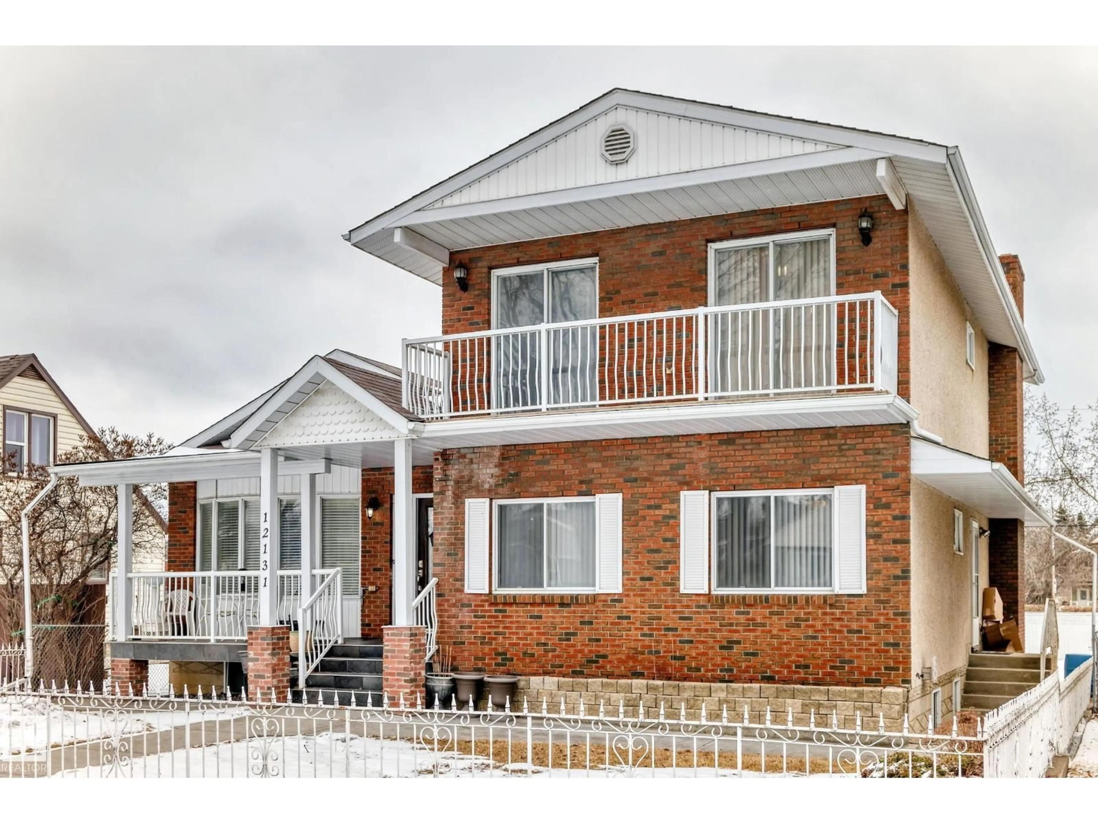 Home with brick exterior material, street for 12131 101 STREET, Edmonton Alberta T5G2C2