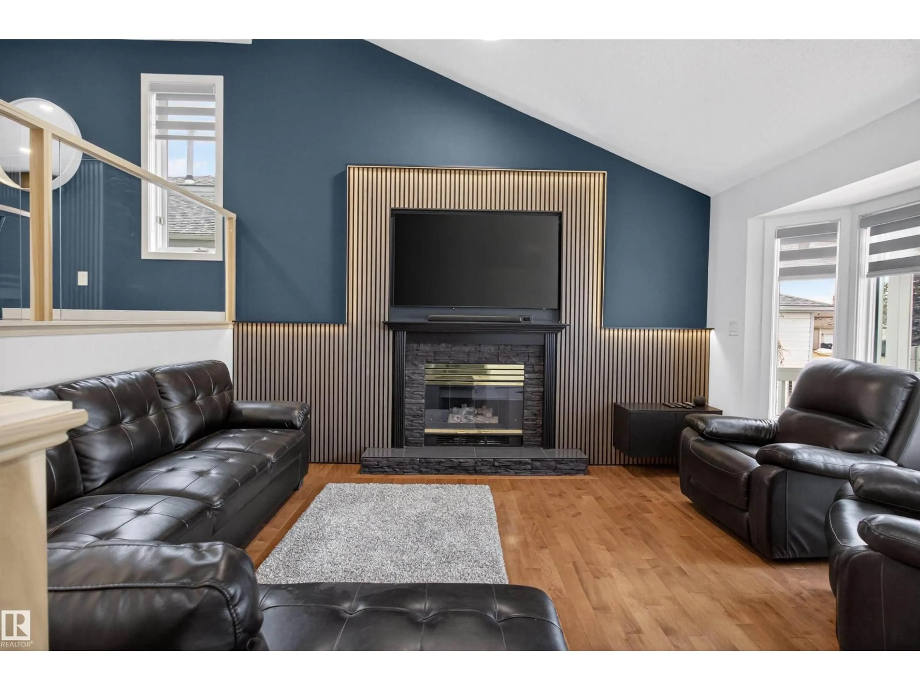 Living room with furniture, wood/laminate floor for 280 REGENCY DR, Sherwood Park Alberta T8A5P4