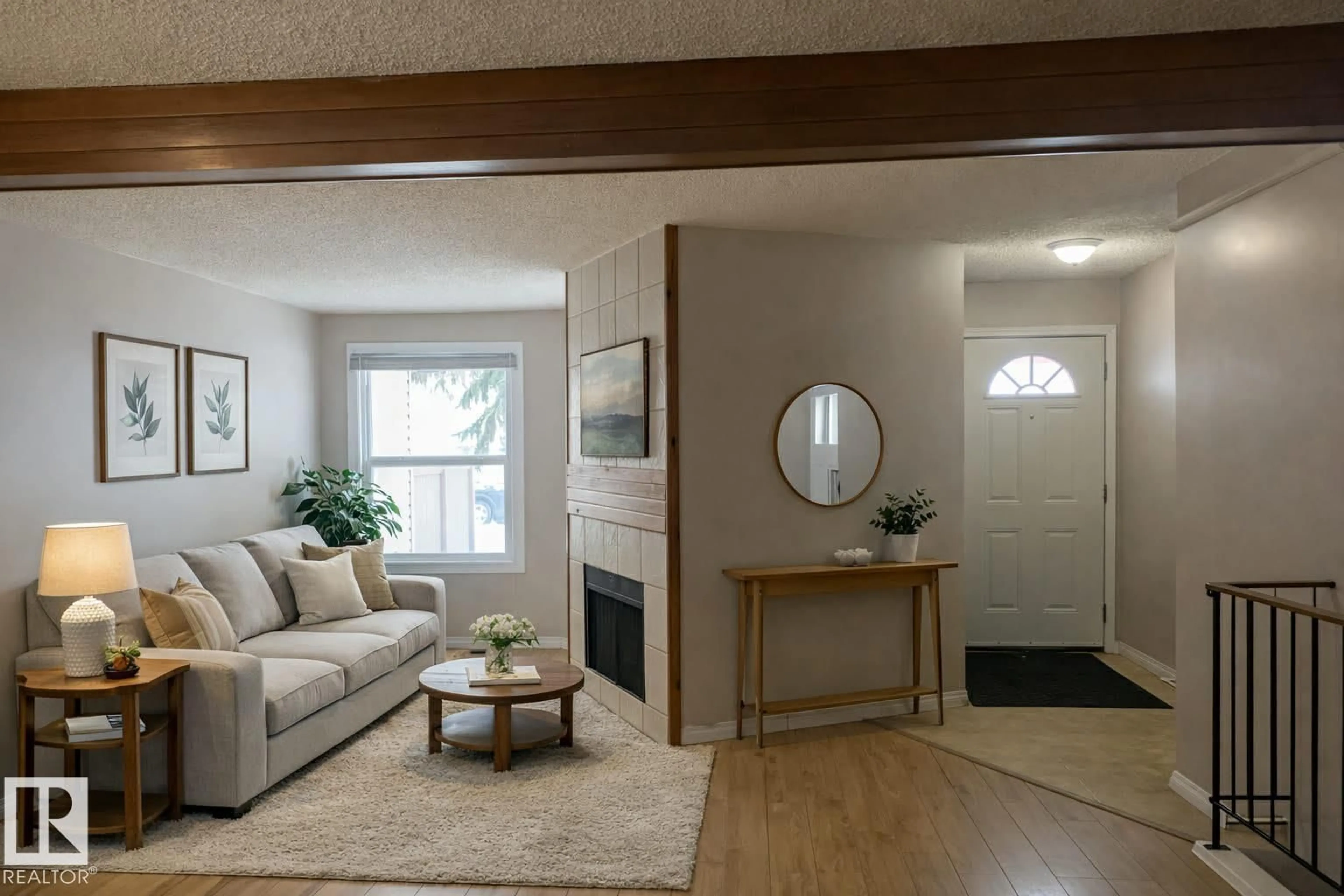 Living room with furniture, wood/laminate floor for 10405 24 AV, Edmonton Alberta T6J4S2