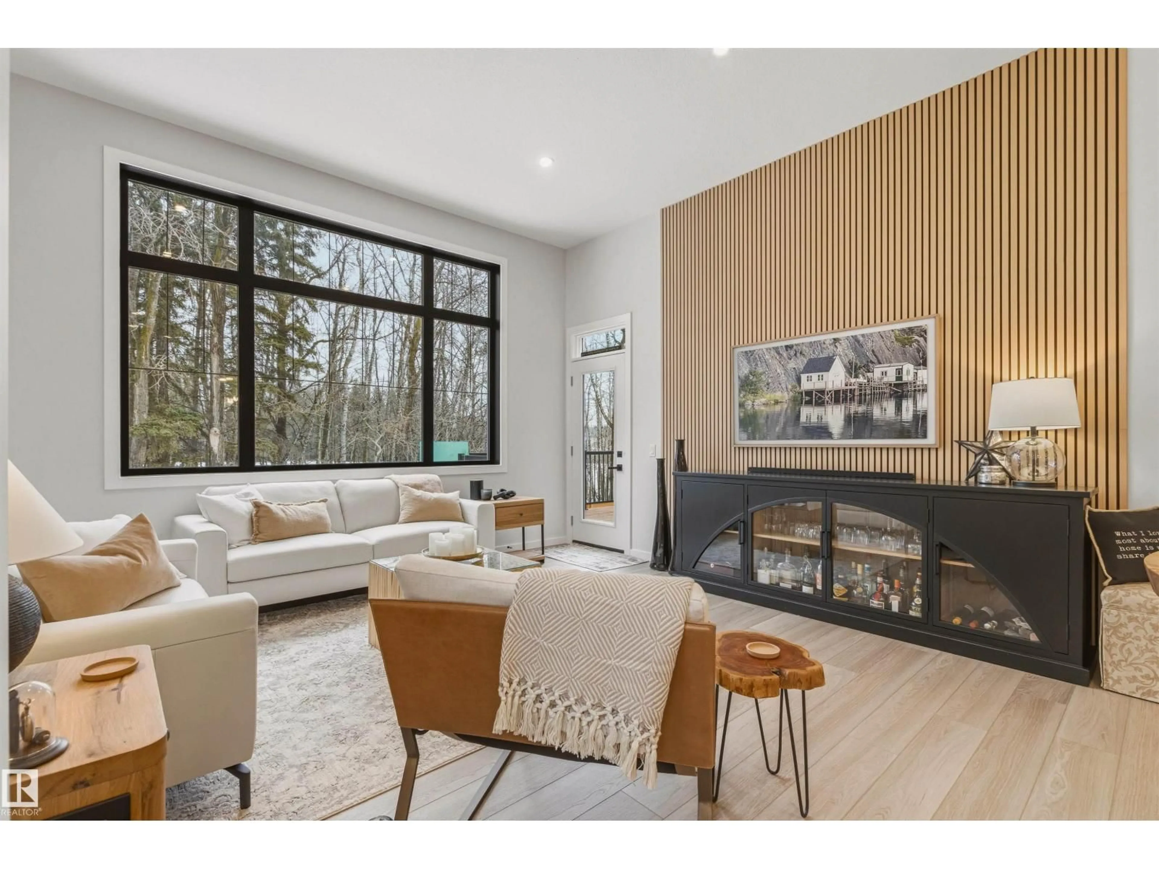 Living room with furniture, wood/laminate floor for 157 REDWING WD, St. Albert Alberta T8N8A5