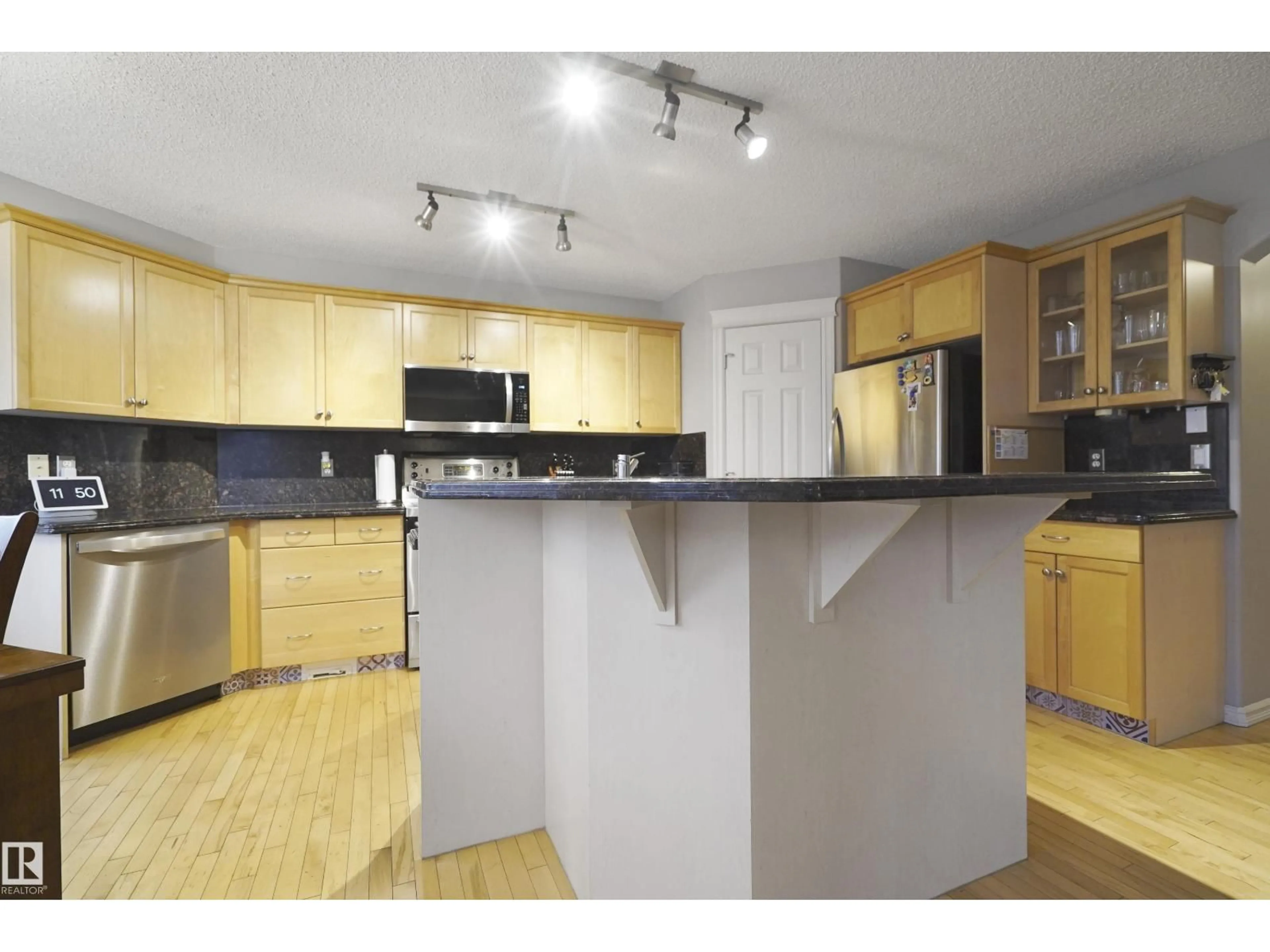 Open concept kitchen, wood/laminate floor for 580 GLENWRIGHT CR, Edmonton Alberta T5T6K8