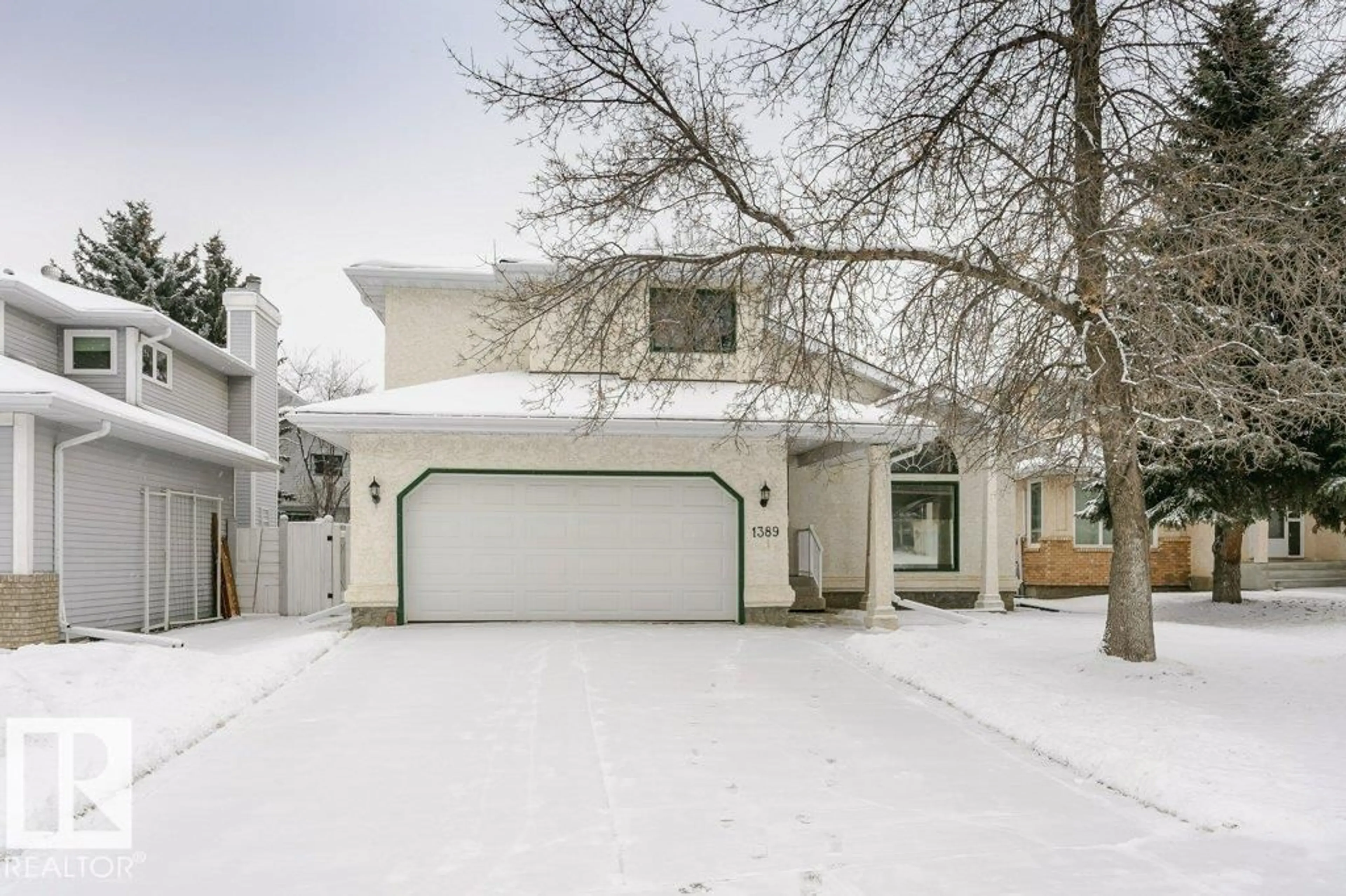 Home with vinyl exterior material, street for 1389 FALCONER RD, Edmonton Alberta T6R2C5