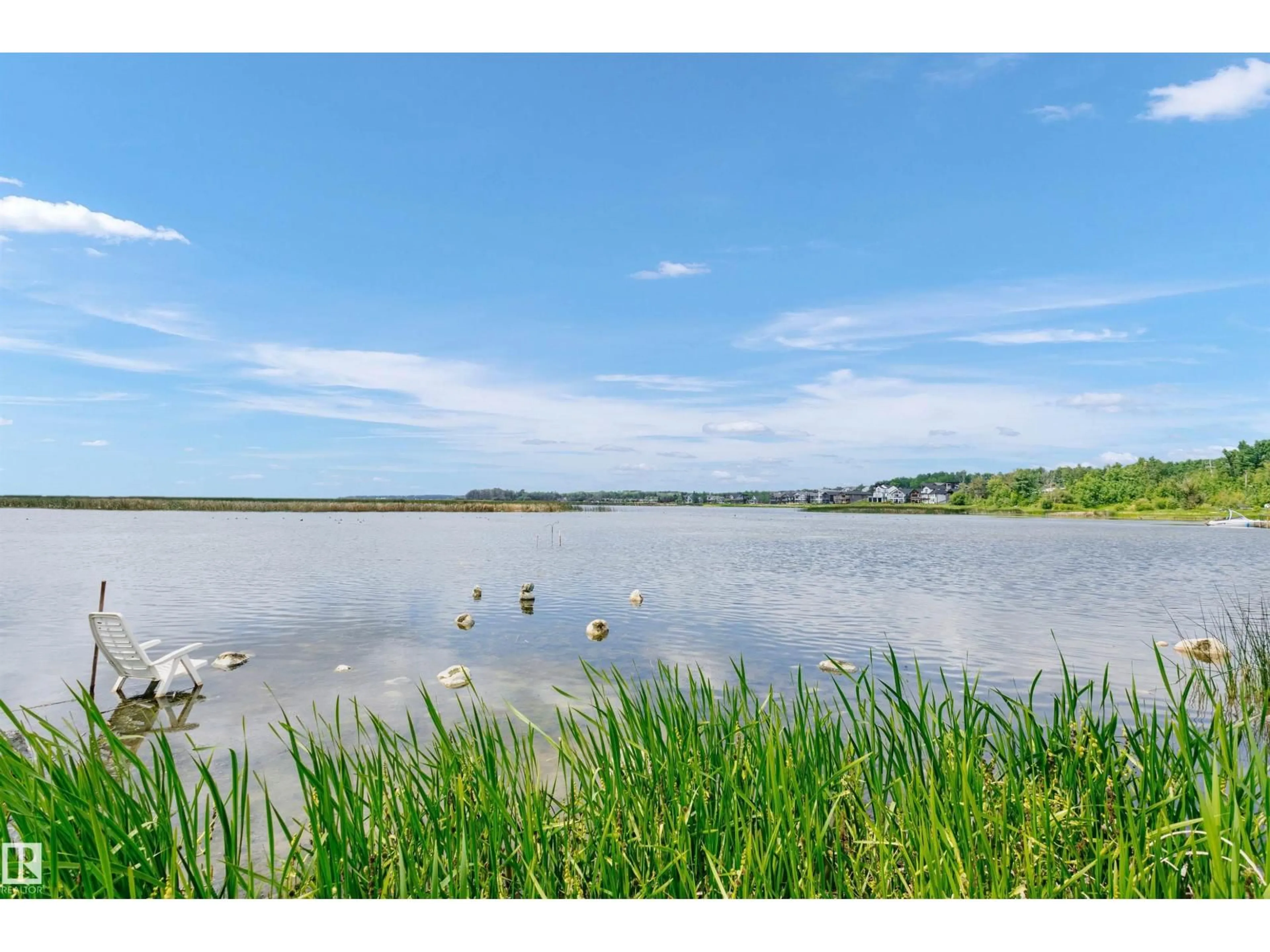 A pic from outside/outdoor area/front of a property/back of a property/a pic from drone, water/lake/river/ocean view for 55022 STE. - 24 ANNE TR, Rural Lac Ste. Anne County Alberta T0E1A1