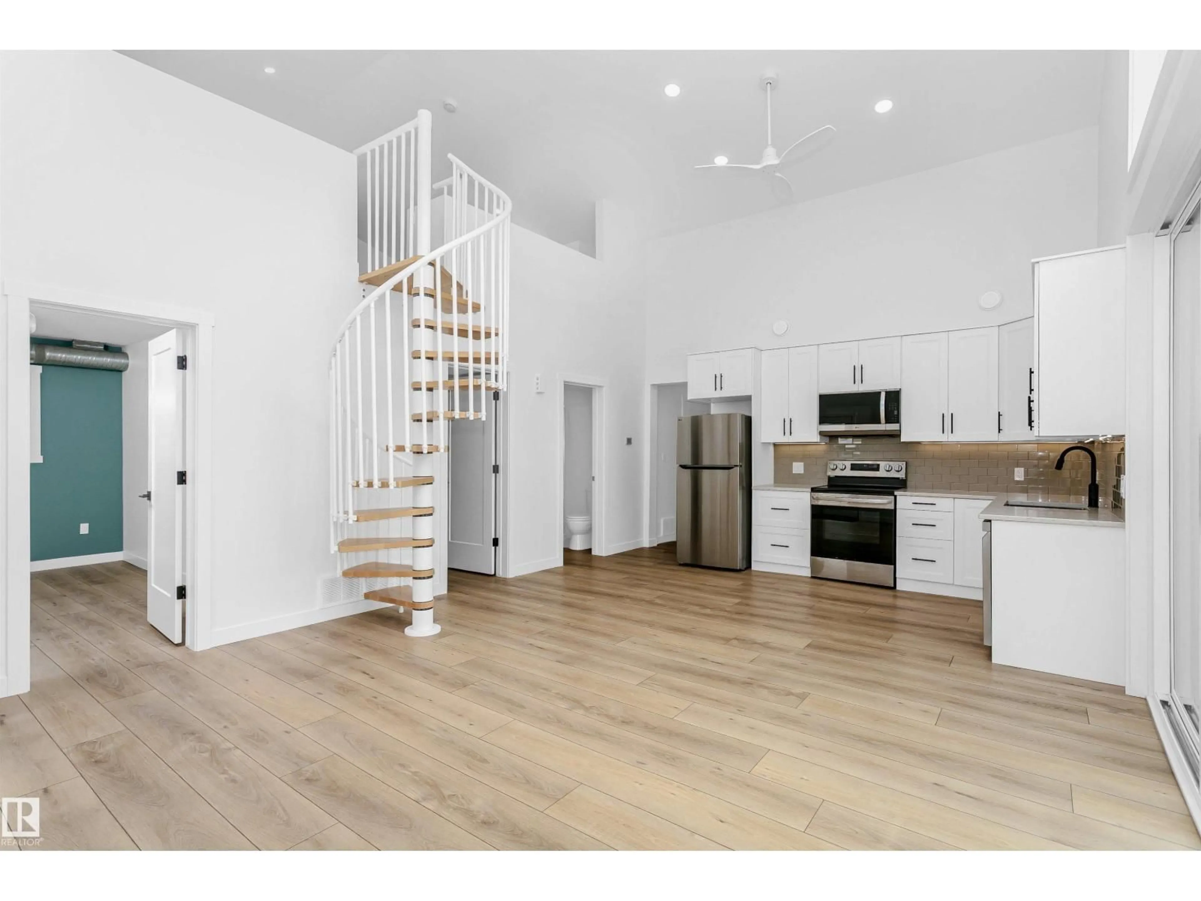 Open concept kitchen, wood/laminate floor for 55022 STE. - 24 ANNE TR, Rural Lac Ste. Anne County Alberta T0E1A1