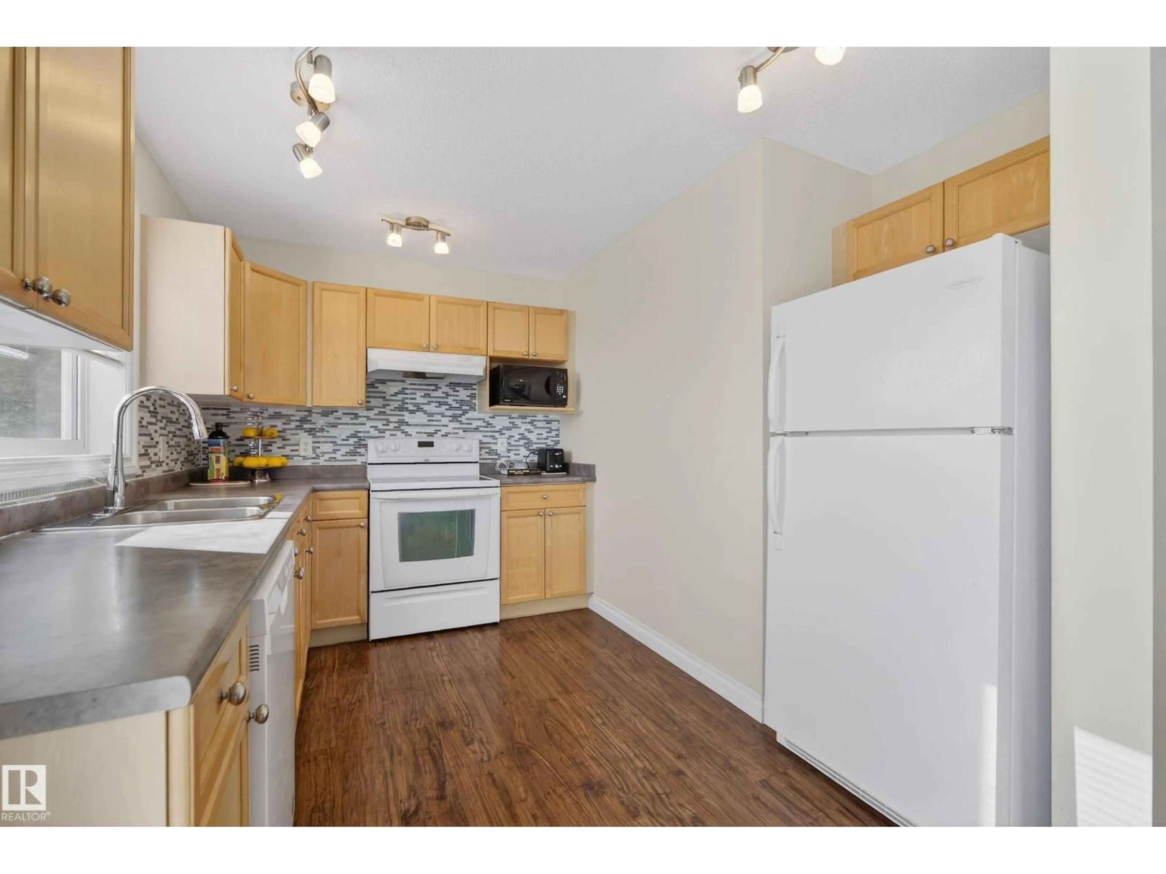 Standard kitchen, wood/laminate floor for #88 - 12050 17 AV, Edmonton Alberta T6W1X4