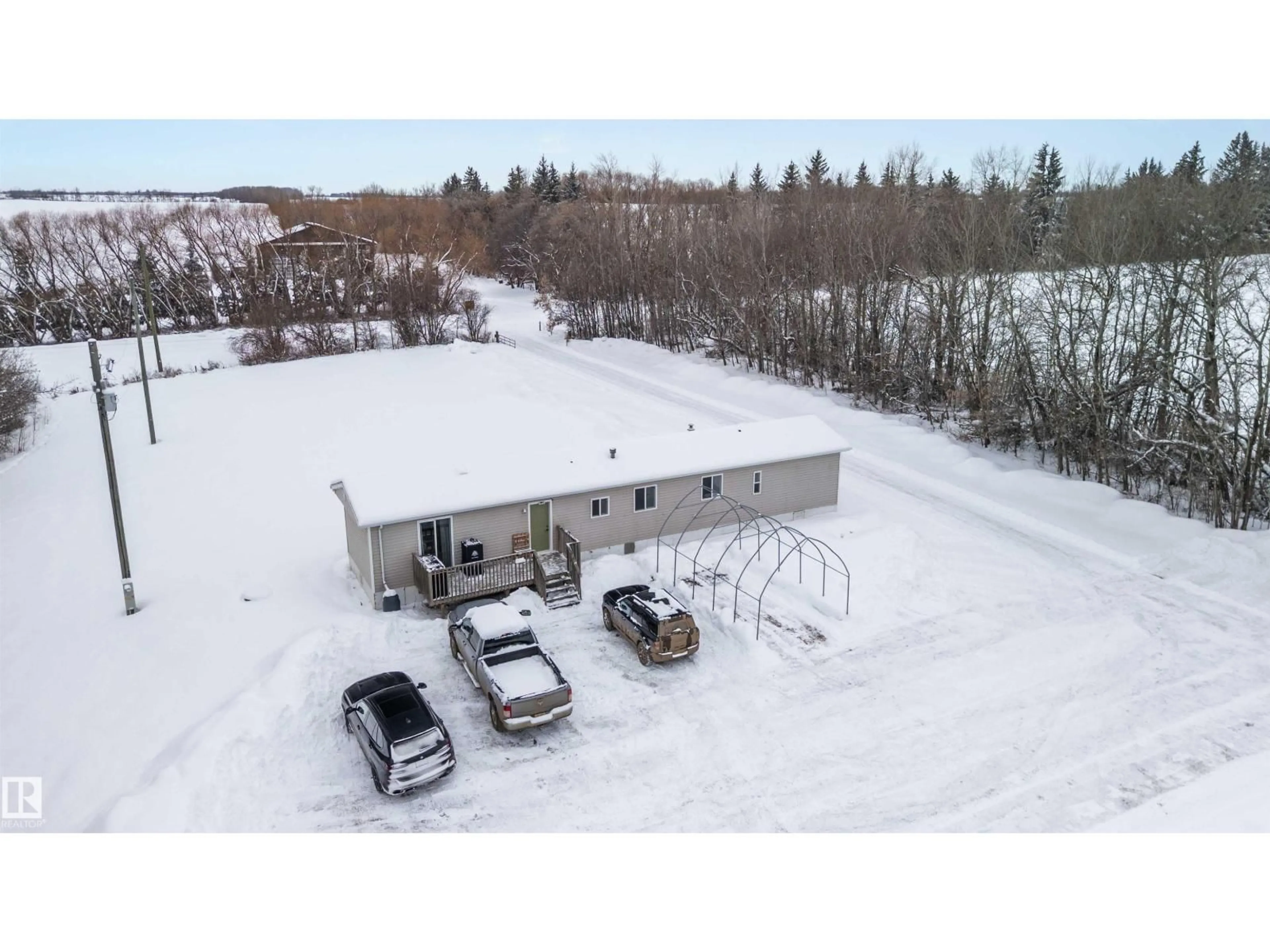 A pic from outside/outdoor area/front of a property/back of a property/a pic from drone, building for 24016 TWP RD 570, Rural Sturgeon County Alberta T0A0K0