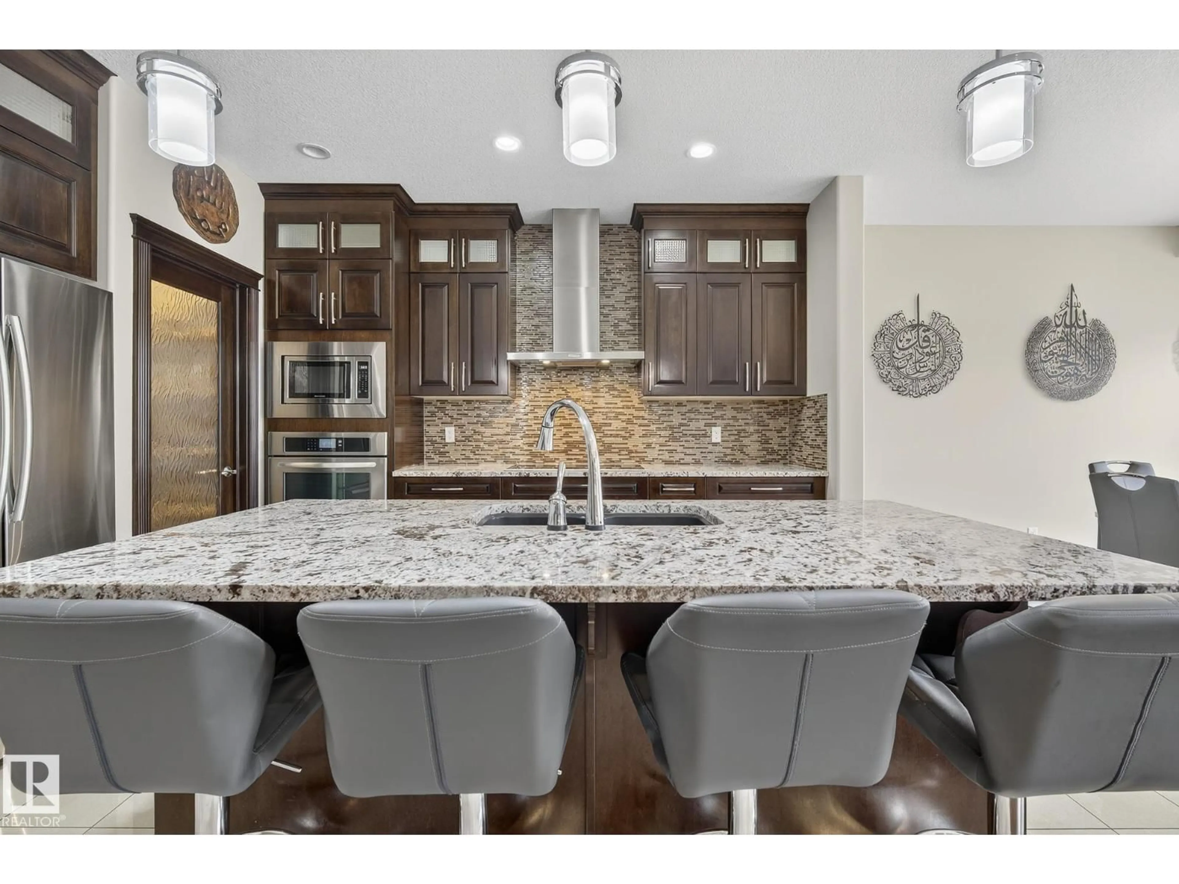 Open concept kitchen, ceramic/tile floor for 16259 137 ST, Edmonton Alberta T6V0J7