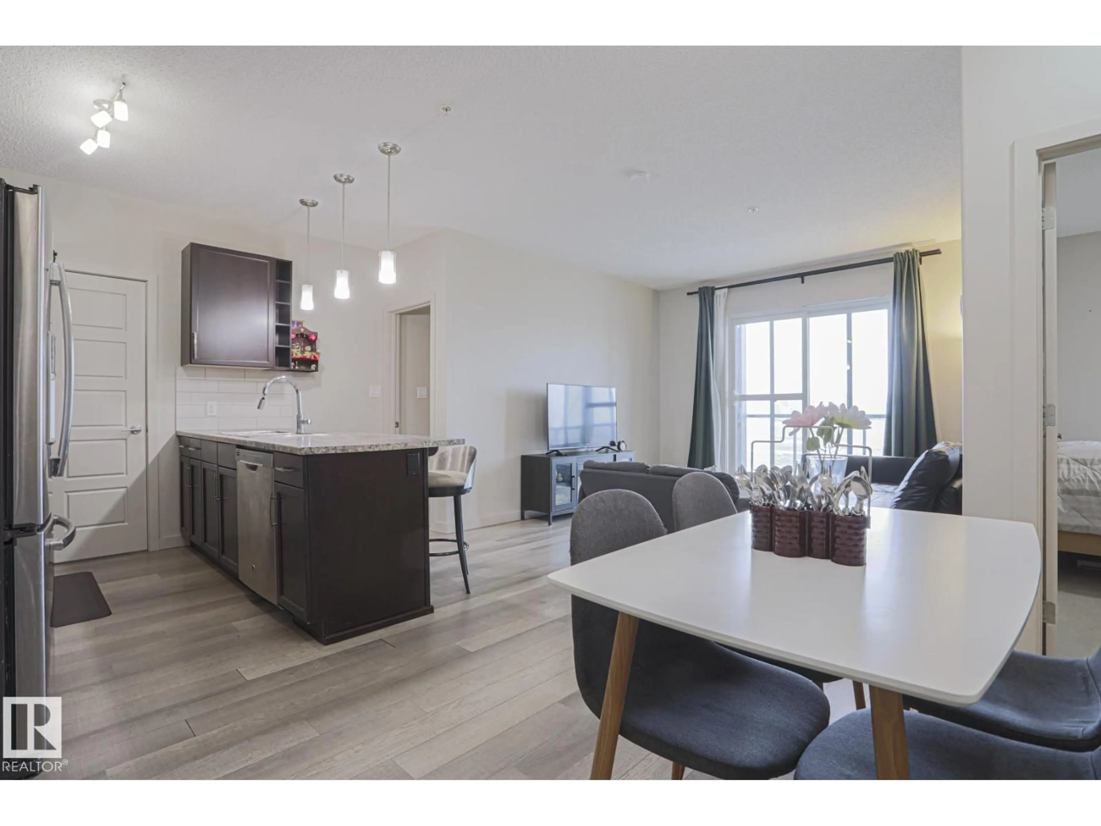 Open concept kitchen, unknown for #212 - 320 AMBLESIDE LINK, Edmonton Alberta T6W2Z9