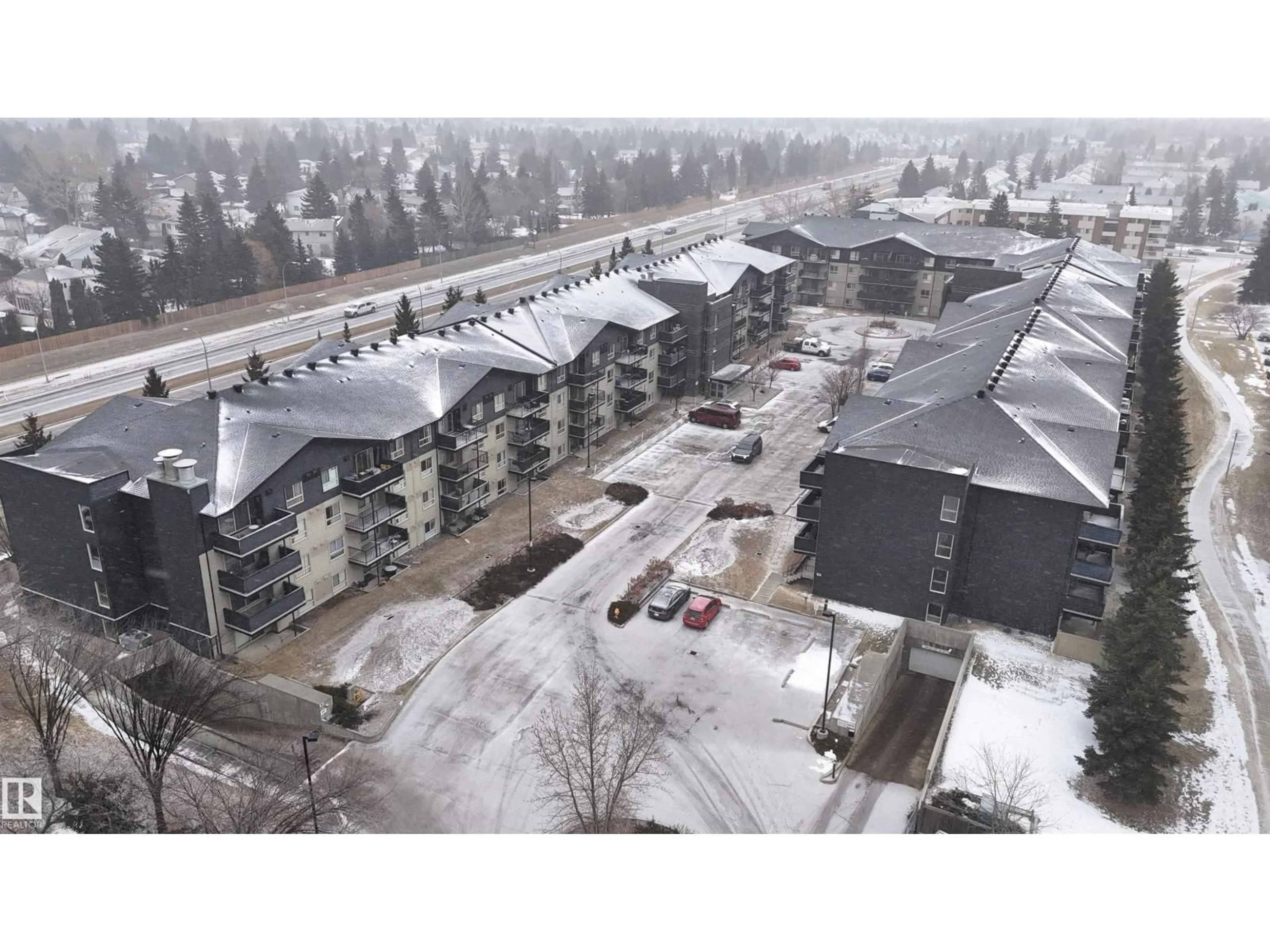 A pic from outside/outdoor area/front of a property/back of a property/a pic from drone, unknown for #104 - 17003 67 AV, Edmonton Alberta T5T6Y5
