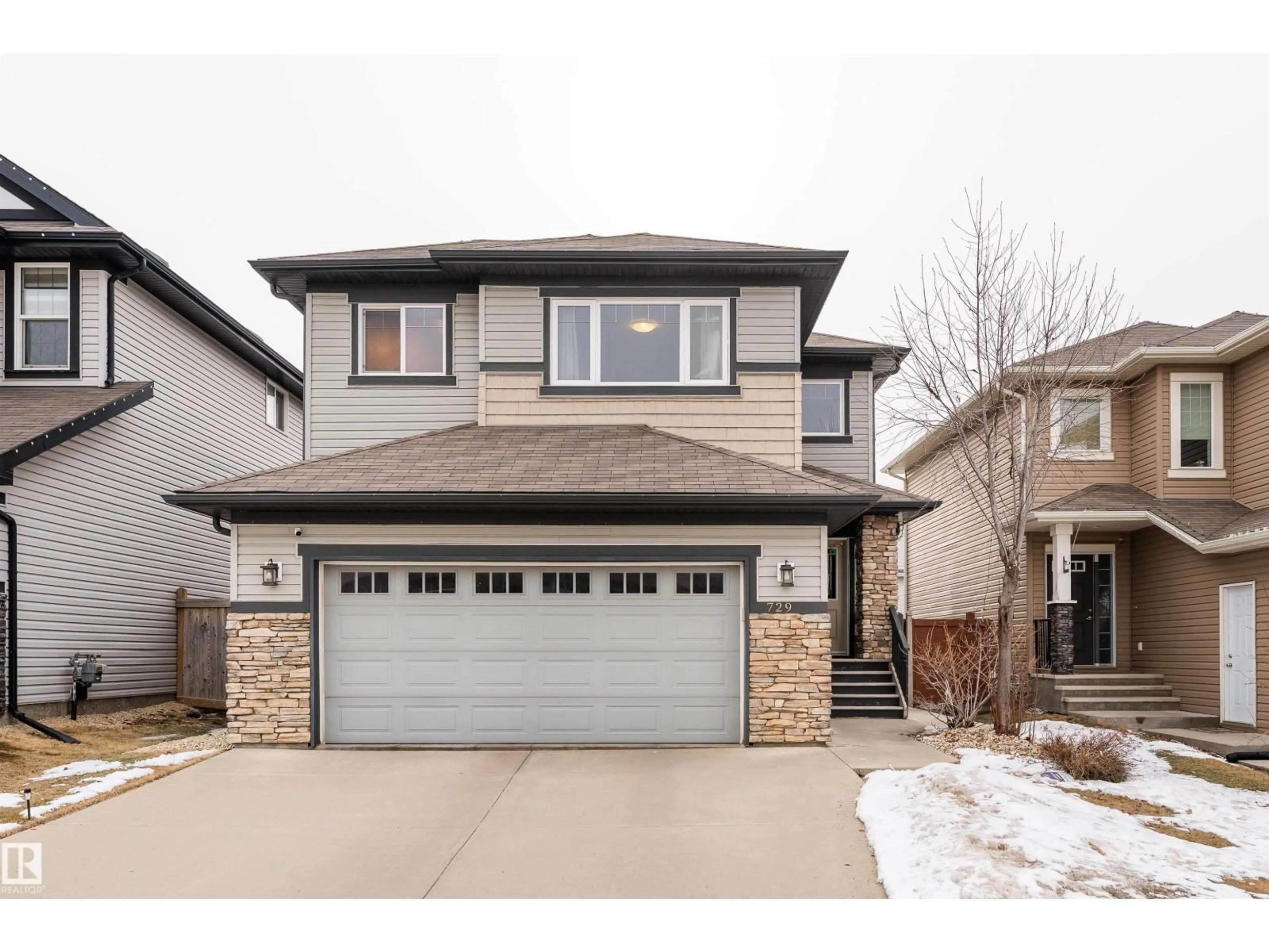 Home with vinyl exterior material, street for 729 37A AV, Edmonton Alberta T6T0S2