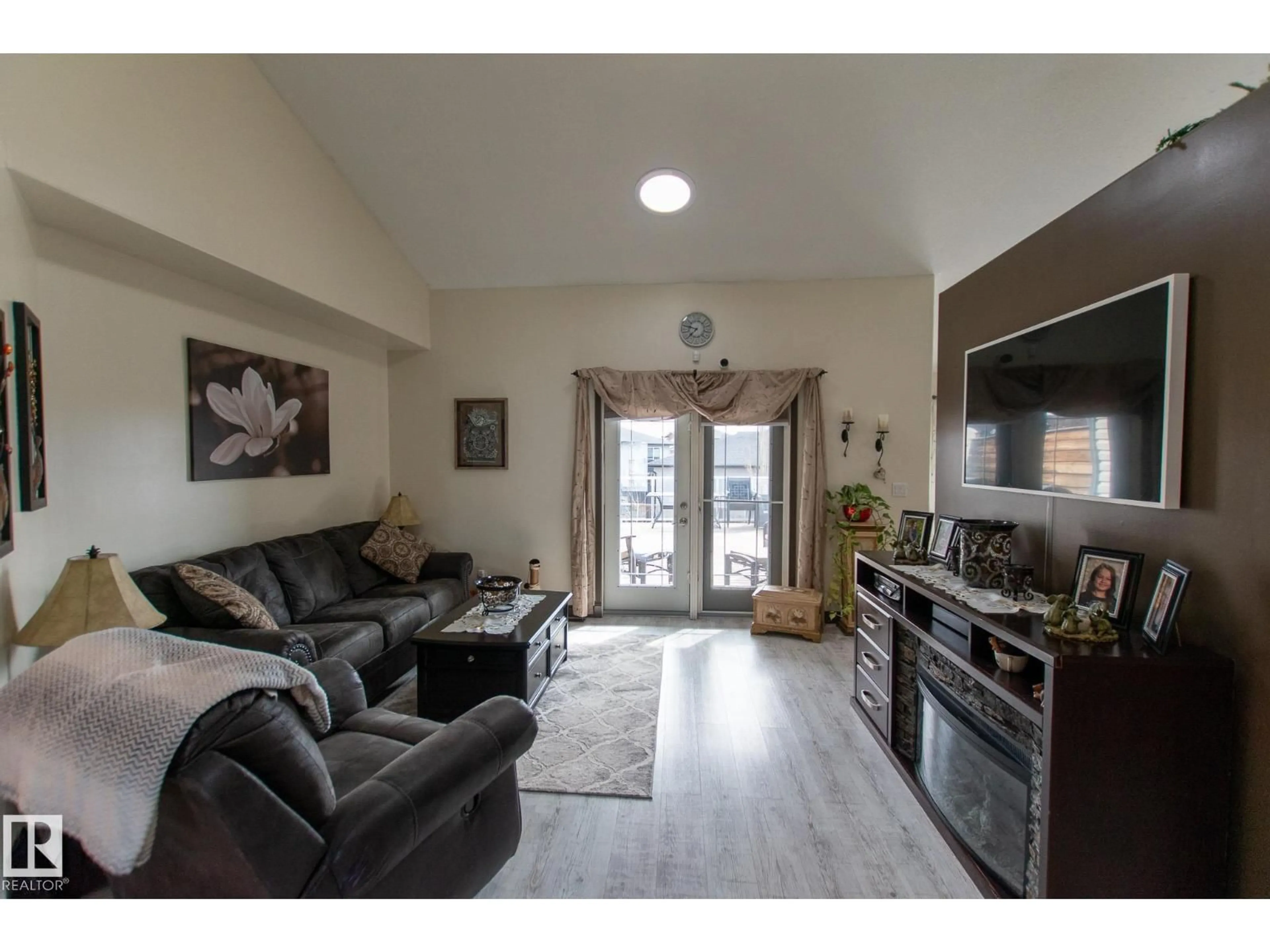 Living room with furniture, unknown for 4403 39 ST, Bonnyville Town Alberta T9N2P4