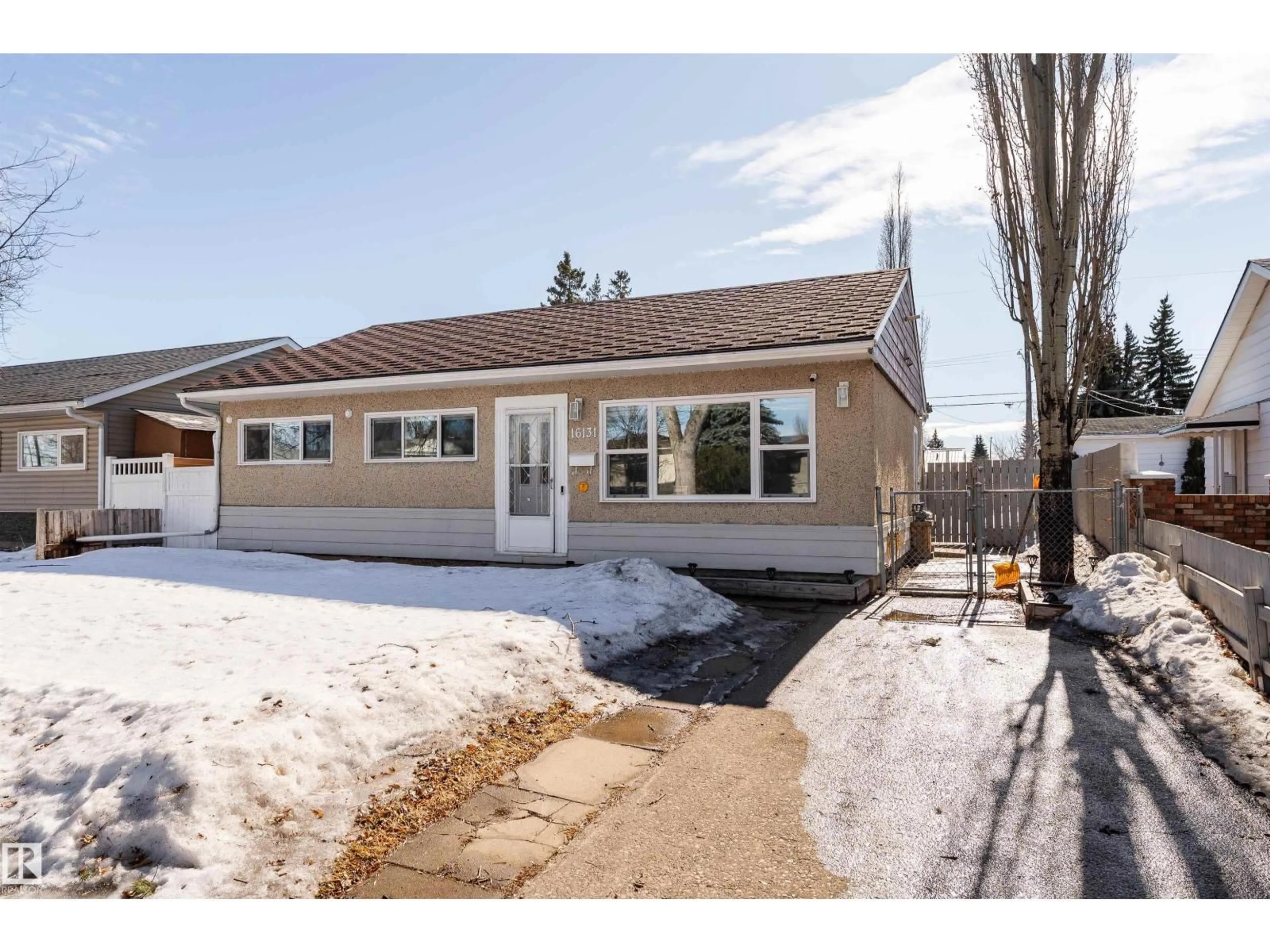 Home with vinyl exterior material, street for 16131 109 AV, Edmonton Alberta T5P4E5