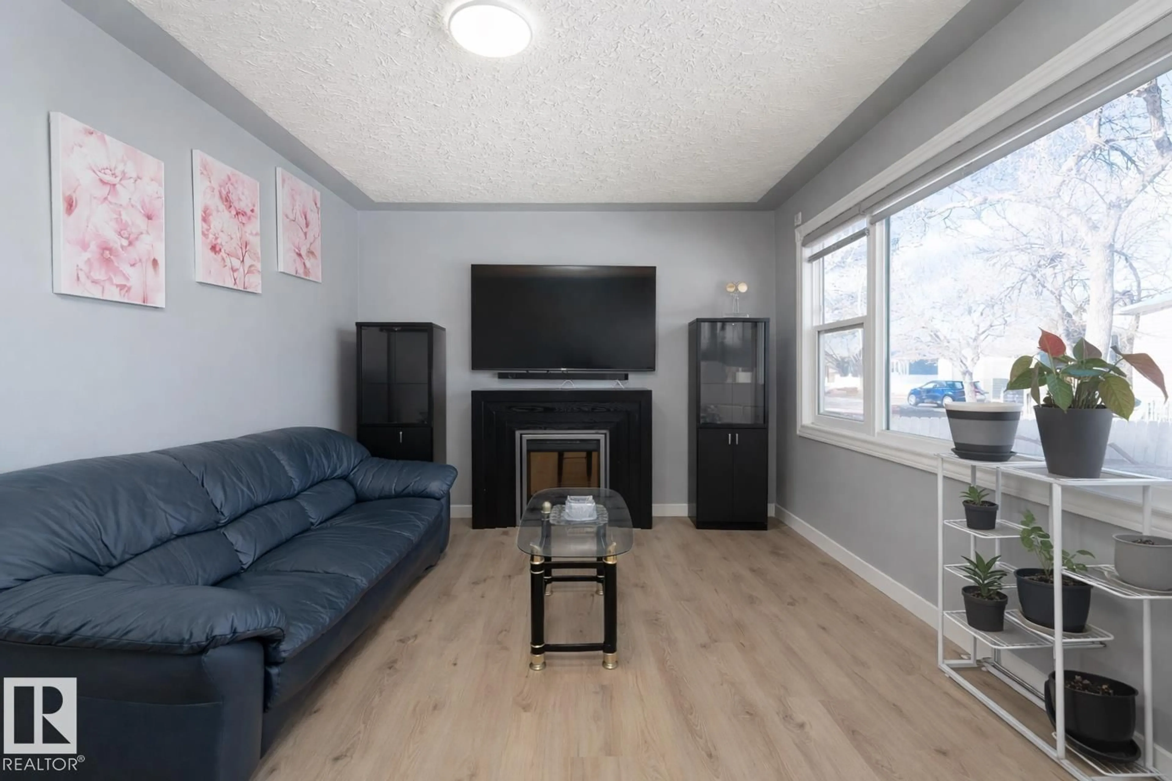 Living room with furniture, unknown for 16131 109 AV, Edmonton Alberta T5P4E5